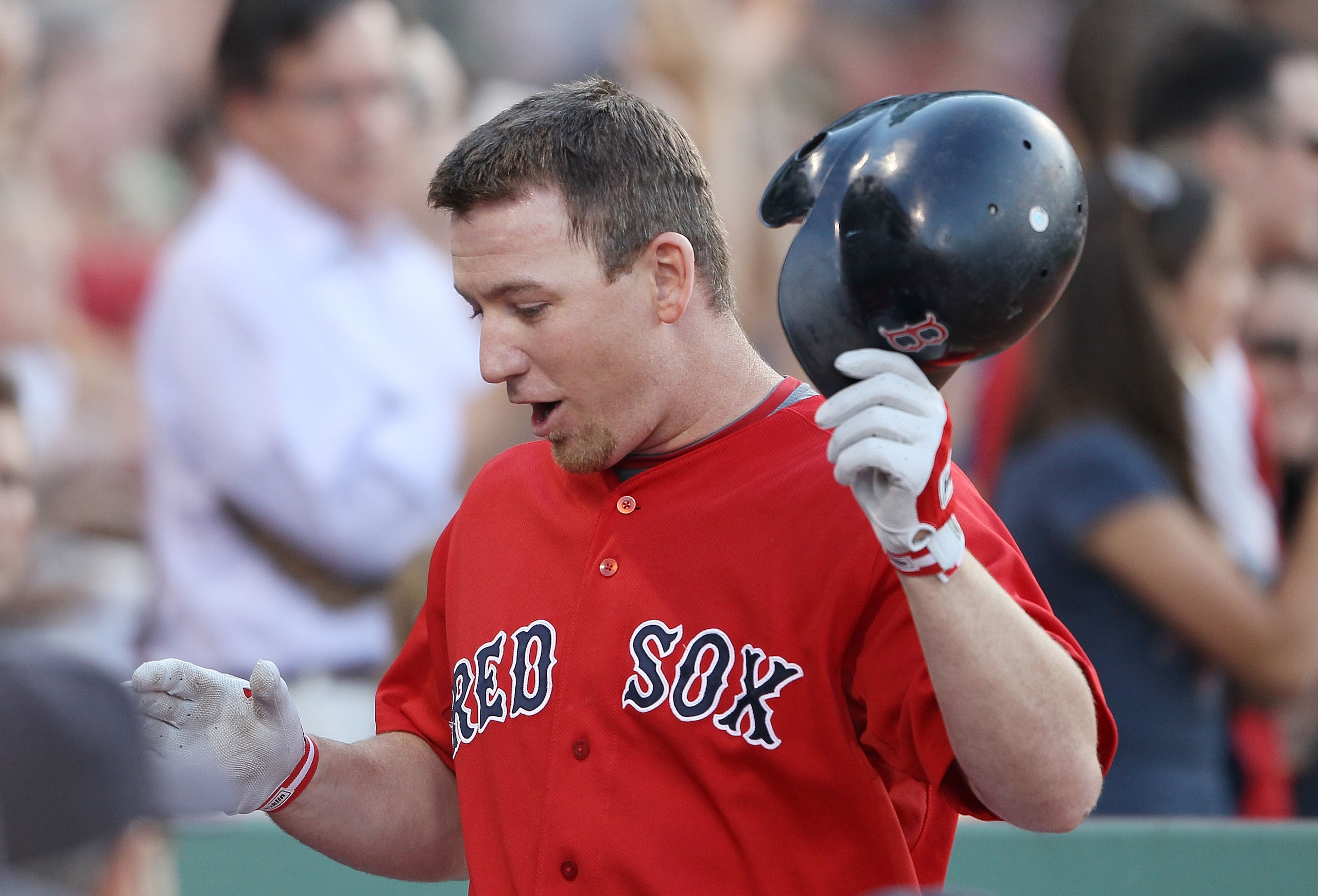 BOSTON - JULY 02:  J.D. Drew #7 of the Boston Red Sox celebrates his home run with teammates in the dugout in the second inning against the Baltimore Orioles on July 2, 2010 at Fenway Park in Boston, Massachusetts.  (Photo by Elsa/Getty Images)