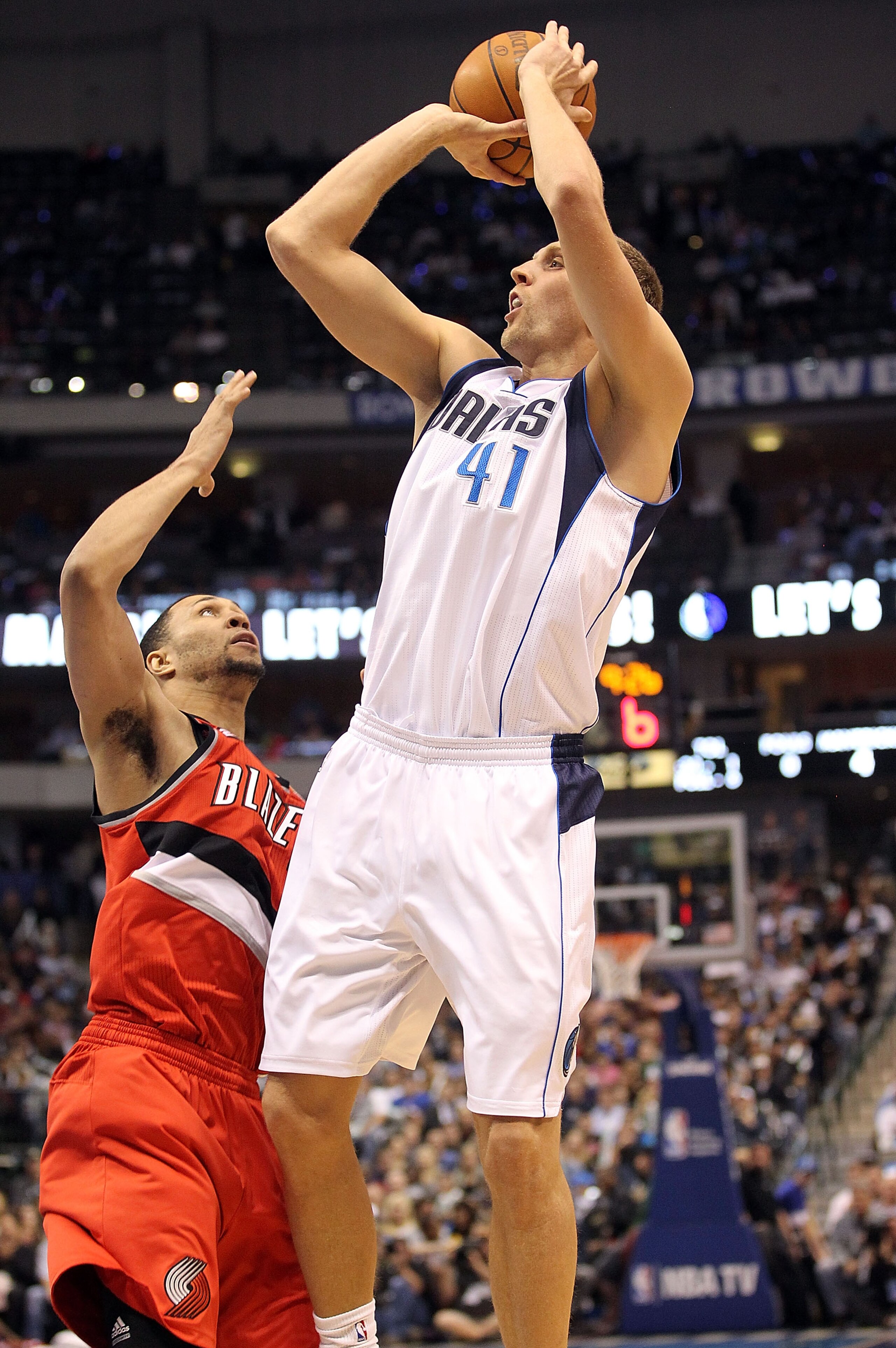 DALLAS, TX - DECEMBER 15: Forward Dirk Nowitzki #41 of the Dallas Mavericks takes a shot against Brandon Roy #7 of the Portland Trail Blazers at American Airlines Center on December 15, 2010 in Dallas, Texas. NOTE TO USER: User expressly acknowledges and DALLAS, TX - DECEMBER 15: Forward Dirk Nowitzki #41 of the Dallas Mavericks takes a shot against Brandon Roy #7 of the Portland Trail Blazers at American Airlines Center on December 15, 2010 in Dallas, Texas. NOTE TO USER: User expressly acknowledges and
