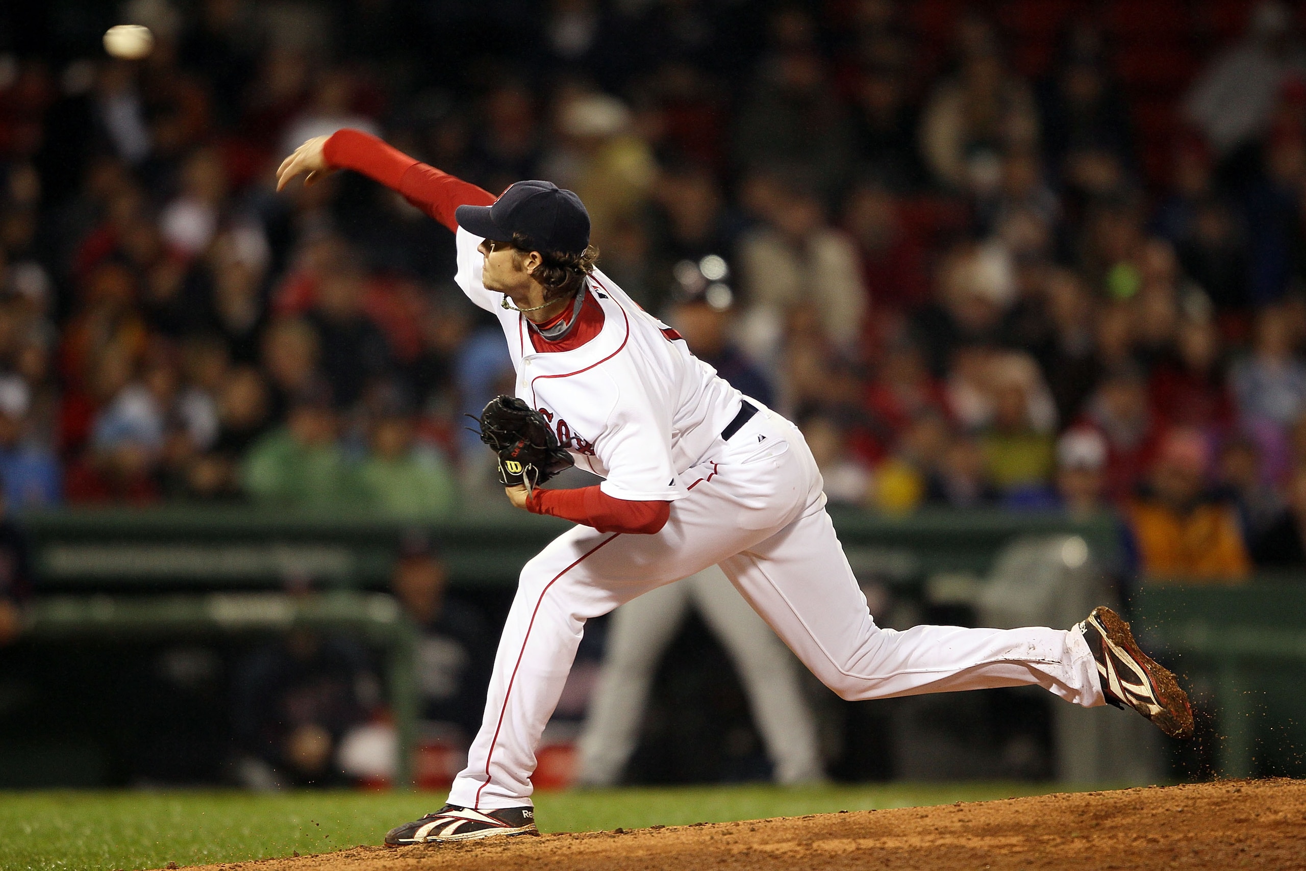 BOSTON - MAY 19:  Clay Buchholz #11 of the Boston Red Sox delivers a pitch in the top of the ninth inning against the Minnesota Twins on May 19, 2010 at Fenway Park in Boston, Massachusetts.  (Photo by Elsa/Getty Images)