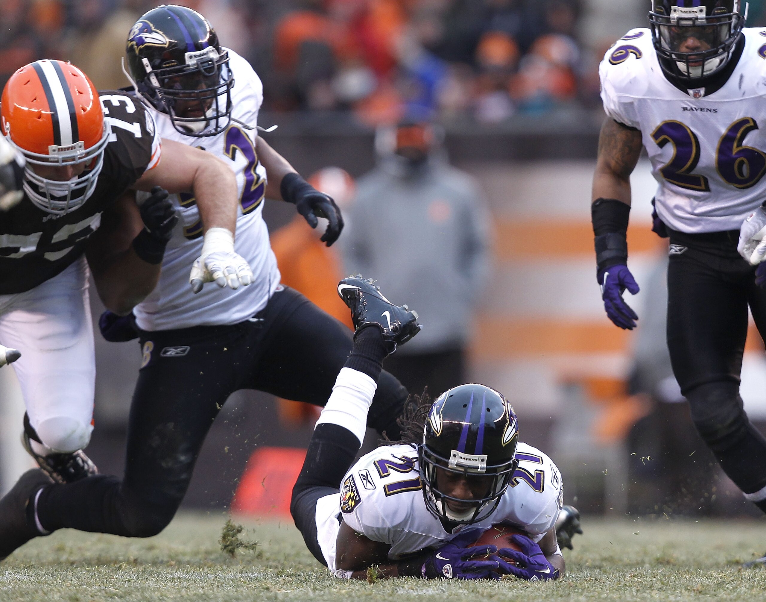 CLEVELAND - DECEMBER 26: Cornerback Lardarius Webb #21 of the Baltimore Ravens recovers a fumble as Ray Lewis #52, Dawan Landry #26 and lineman Joe Thomas #73 of the Cleveland Browns look on at Cleveland Browns Stadium on December 26, 2010 in Cleveland, CLEVELAND - DECEMBER 26: Cornerback Lardarius Webb #21 of the Baltimore Ravens recovers a fumble as Ray Lewis #52, Dawan Landry #26 and lineman Joe Thomas #73 of the Cleveland Browns look on at Cleveland Browns Stadium on December 26, 2010 in Cleveland,
