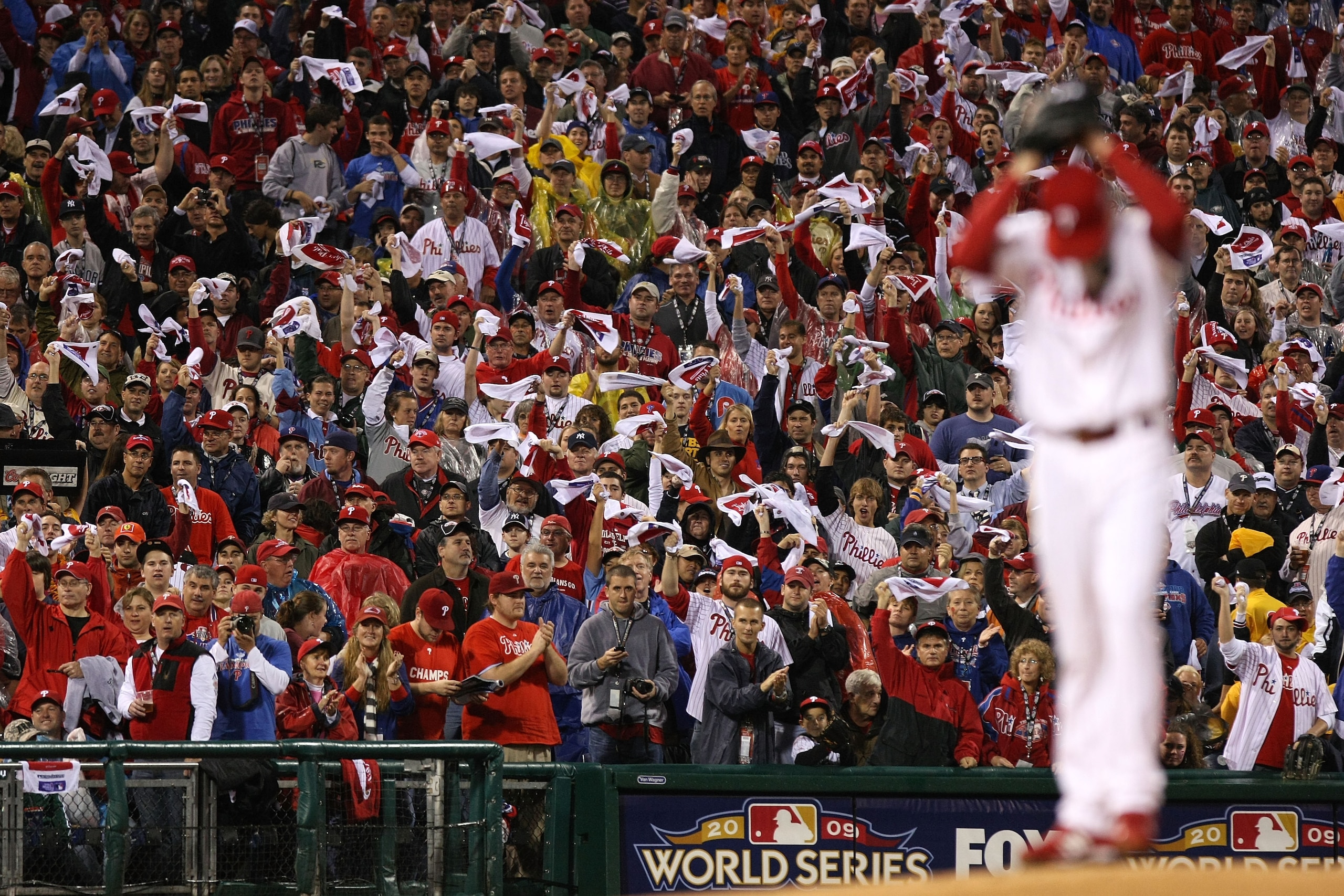 PHILADELPHIA - OCTOBER 31:  Fans cheer as Starting pitcher Cole Hamels #35 of the Philadelphia Phillies pitches against the New York Yankees in Game Three of the 2009 MLB World Series at Citizens Bank Park on October 31, 2009 in Philadelphia, Pennsylvania