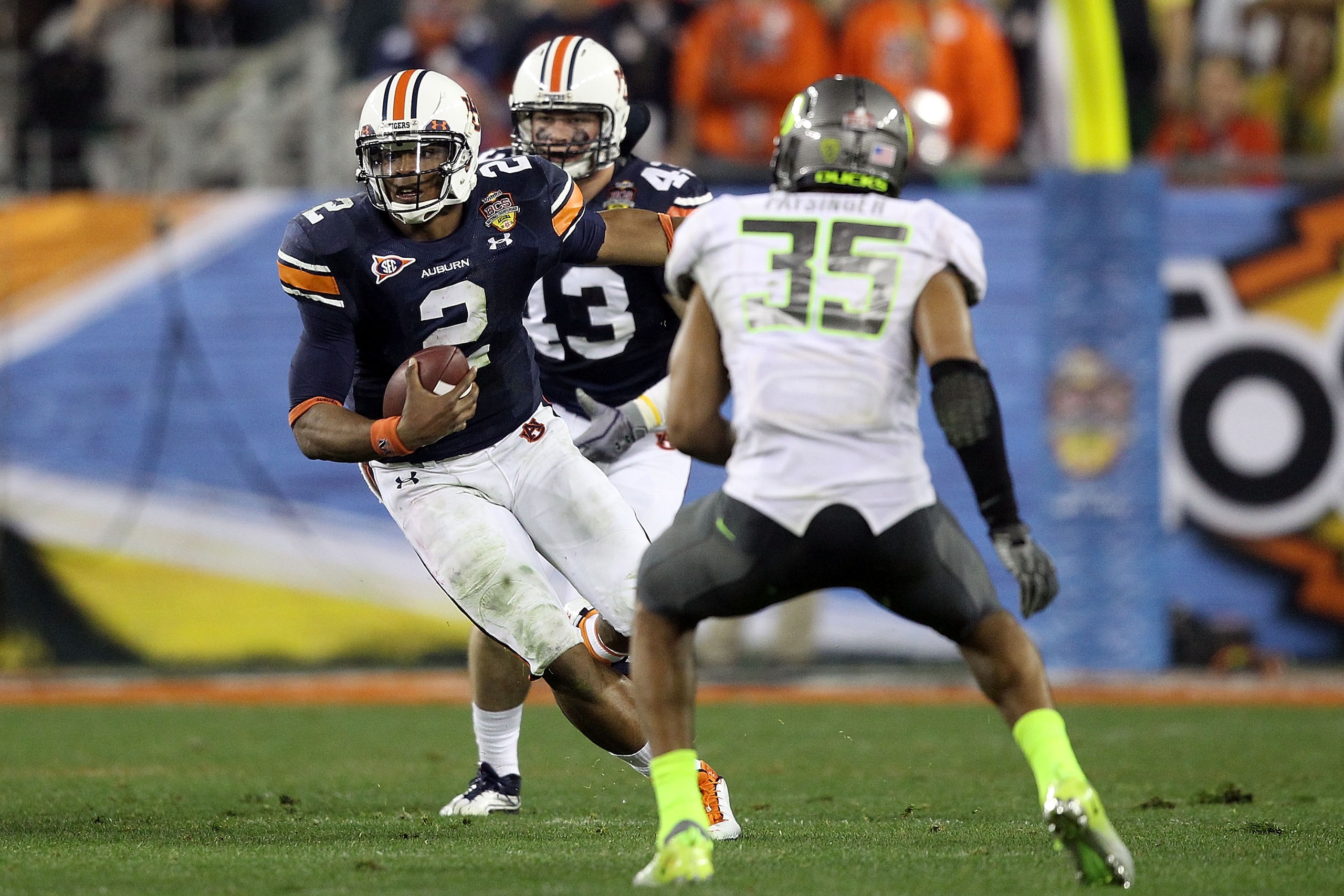 GLENDALE, AZ - JANUARY 10:  Cameron Newton #2 of the Auburn Tigers runs the ball against the Oregon Ducks during the Tostitos BCS National Championship Game at University of Phoenix Stadium on January 10, 2011 in Glendale, Arizona.  (Photo by Christian Pe