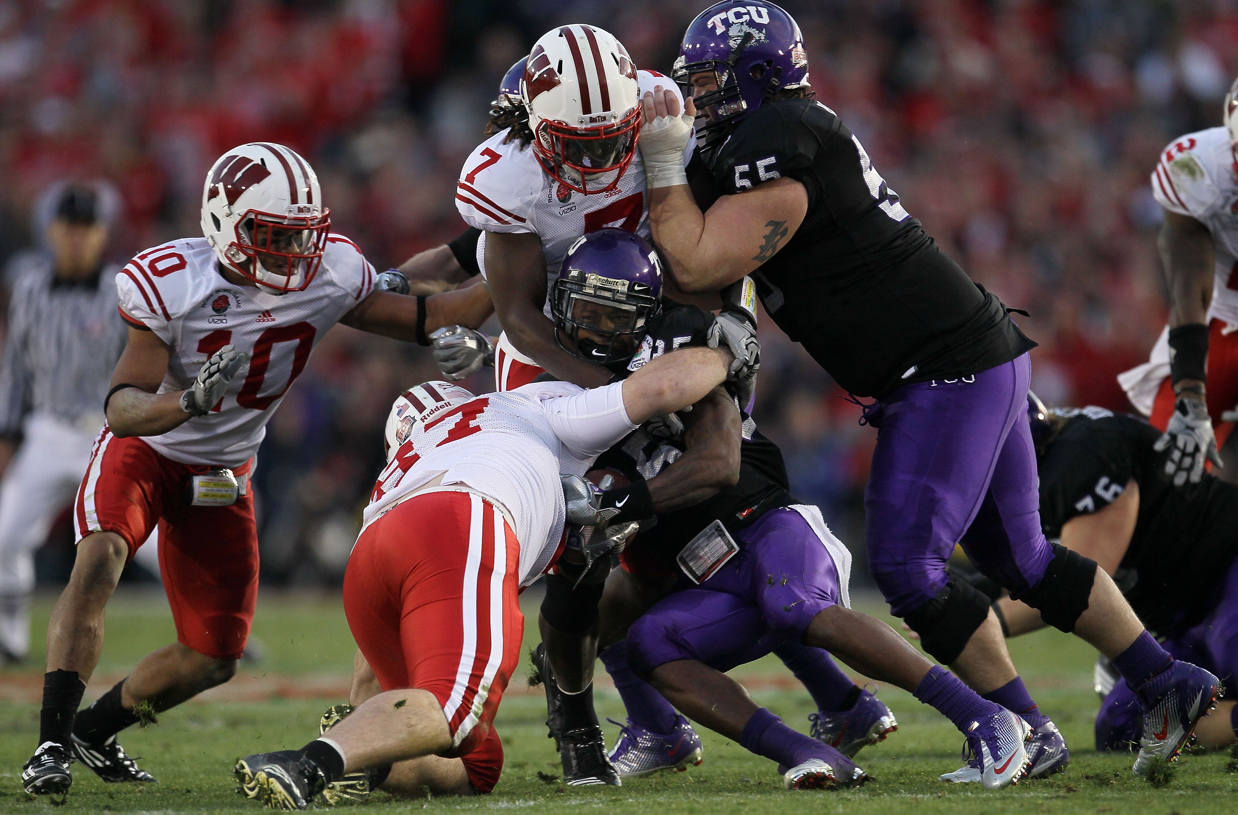 PASADENA, CA - JANUARY 01:  Wide receiver Jeremy Kerley #85 of the TCU Horned Frogs is tackled after a catch against the Wisconsin Badgers in the 97th Rose Bowl game on January 1, 2011 in Pasadena, California.  (Photo by Stephen Dunn/Getty Images)