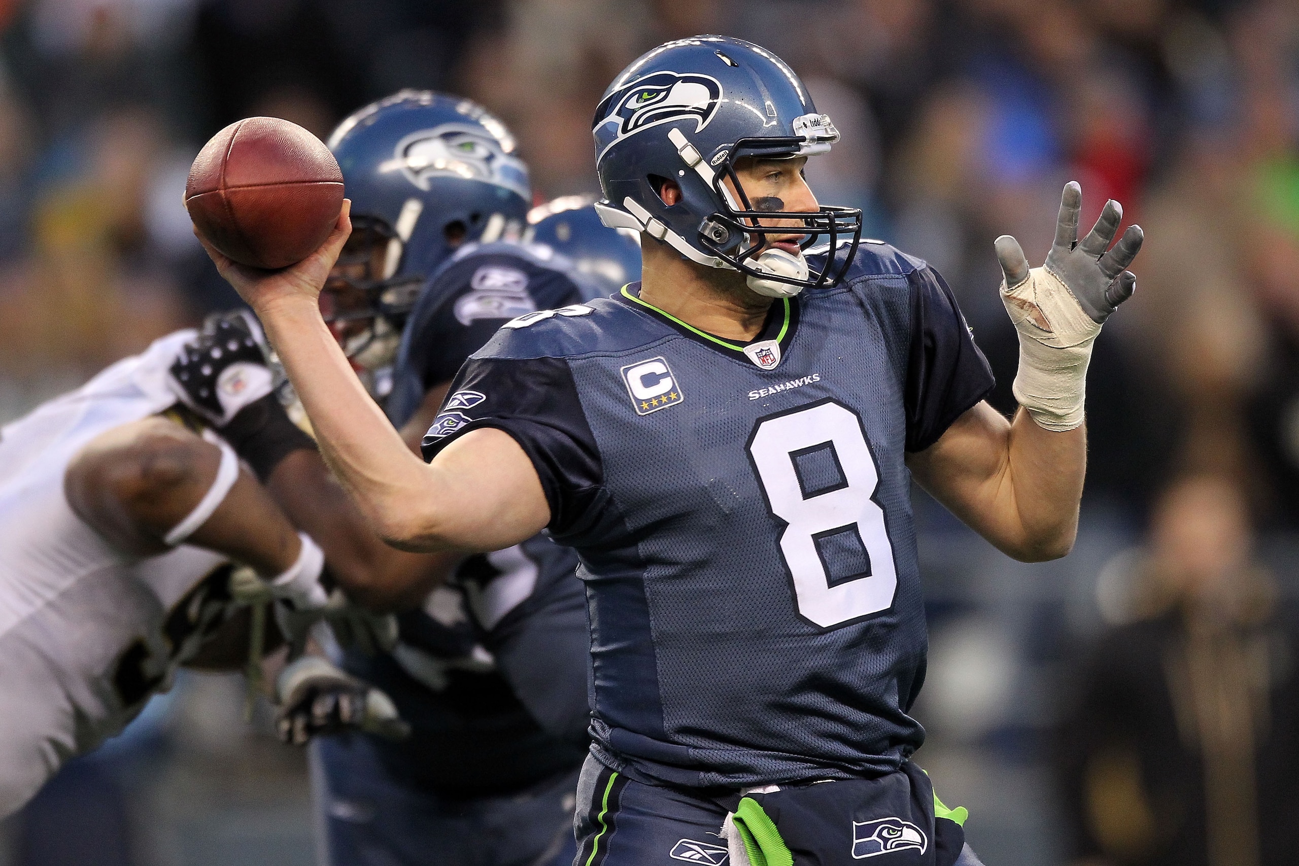 SEATTLE, WA - JANUARY 08: Quarterback Matt Hasselbeck #8 of the Seattle Seahawks throws the ball in the second half against the New Orleans Saints during the 2011 NFC wild-card playoff game at Qwest Field on January 8, 2011 in Seattle, Washington. (Phot SEATTLE, WA - JANUARY 08: Quarterback Matt Hasselbeck #8 of the Seattle Seahawks throws the ball in the second half against the New Orleans Saints during the 2011 NFC wild-card playoff game at Qwest Field on January 8, 2011 in Seattle, Washington. (Phot