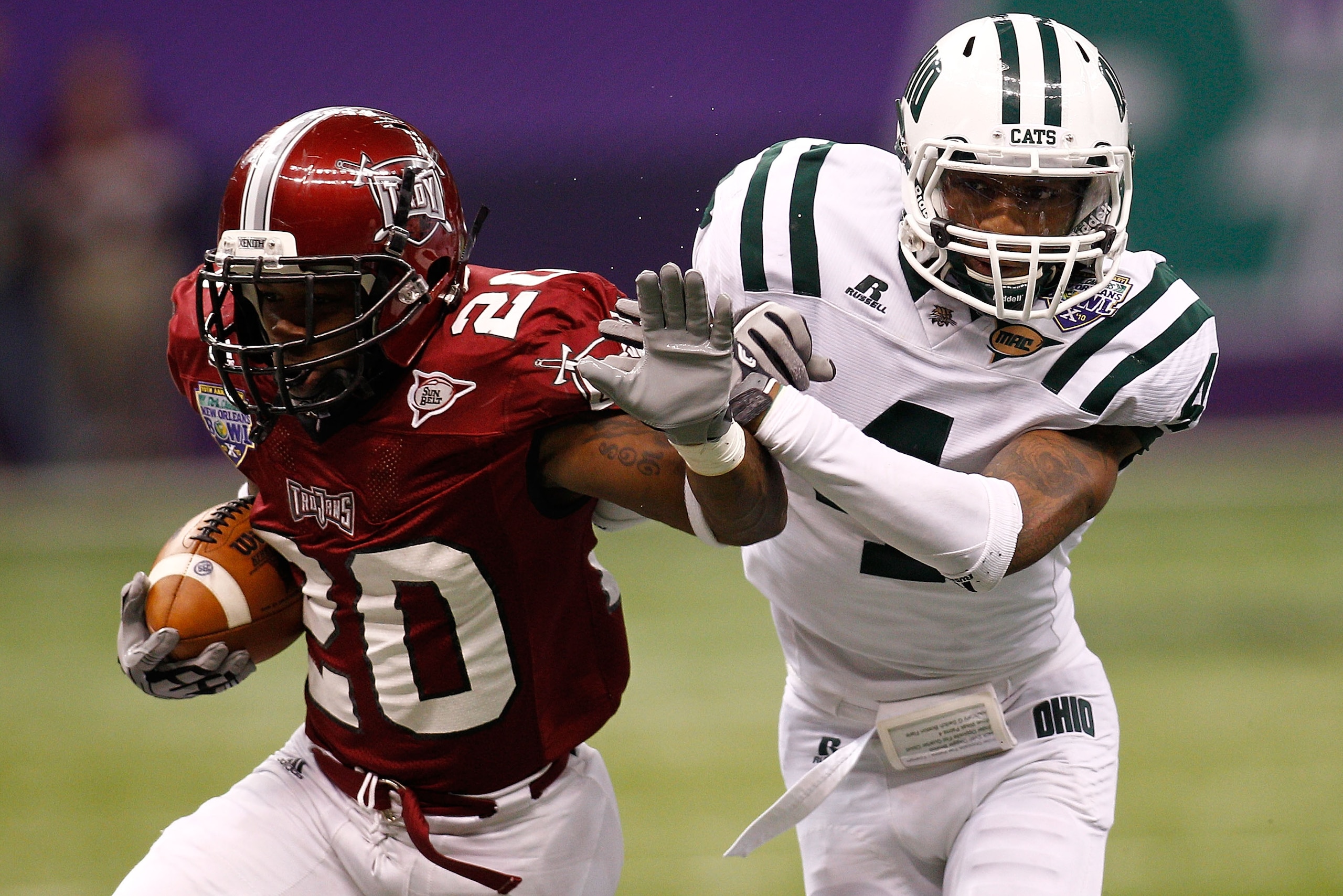 NEW ORLEANS, LA - DECEMBER 18: Shawn Southward #20 of the Troy University Trojans is pushed out of bounds by Omar Leftwich #4 of the Ohio University Bobcats during the R&L Carriers New Orleans Bowl at the Louisiana Superdome on December 18, 2010 in New NEW ORLEANS, LA - DECEMBER 18: Shawn Southward #20 of the Troy University Trojans is pushed out of bounds by Omar Leftwich #4 of the Ohio University Bobcats during the R&L Carriers New Orleans Bowl at the Louisiana Superdome on December 18, 2010 in New