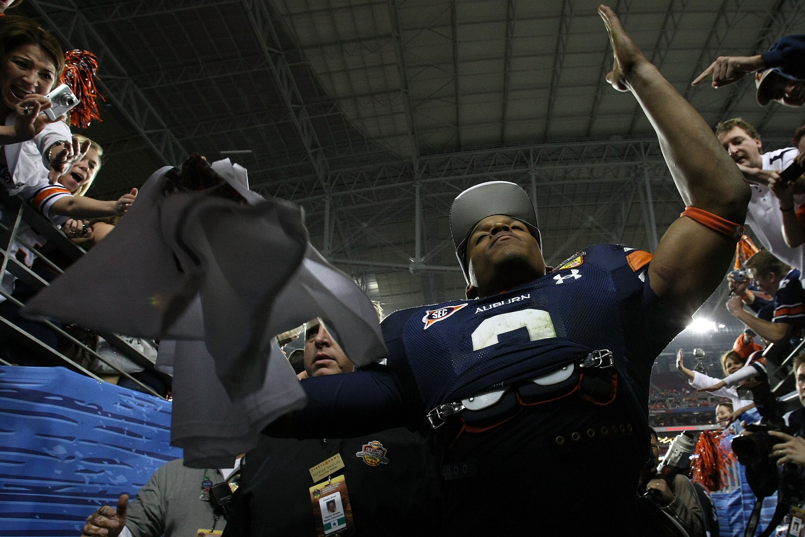 GLENDALE, AZ - JANUARY 10:  Quarterback Cameron Newton #2 of the Auburn Tigers celebrates the Tigers 22-19 victory against the Oregon Ducks in the Tostitos BCS National Championship Game at University of Phoenix Stadium on January 10, 2011 in Glendale, Ar