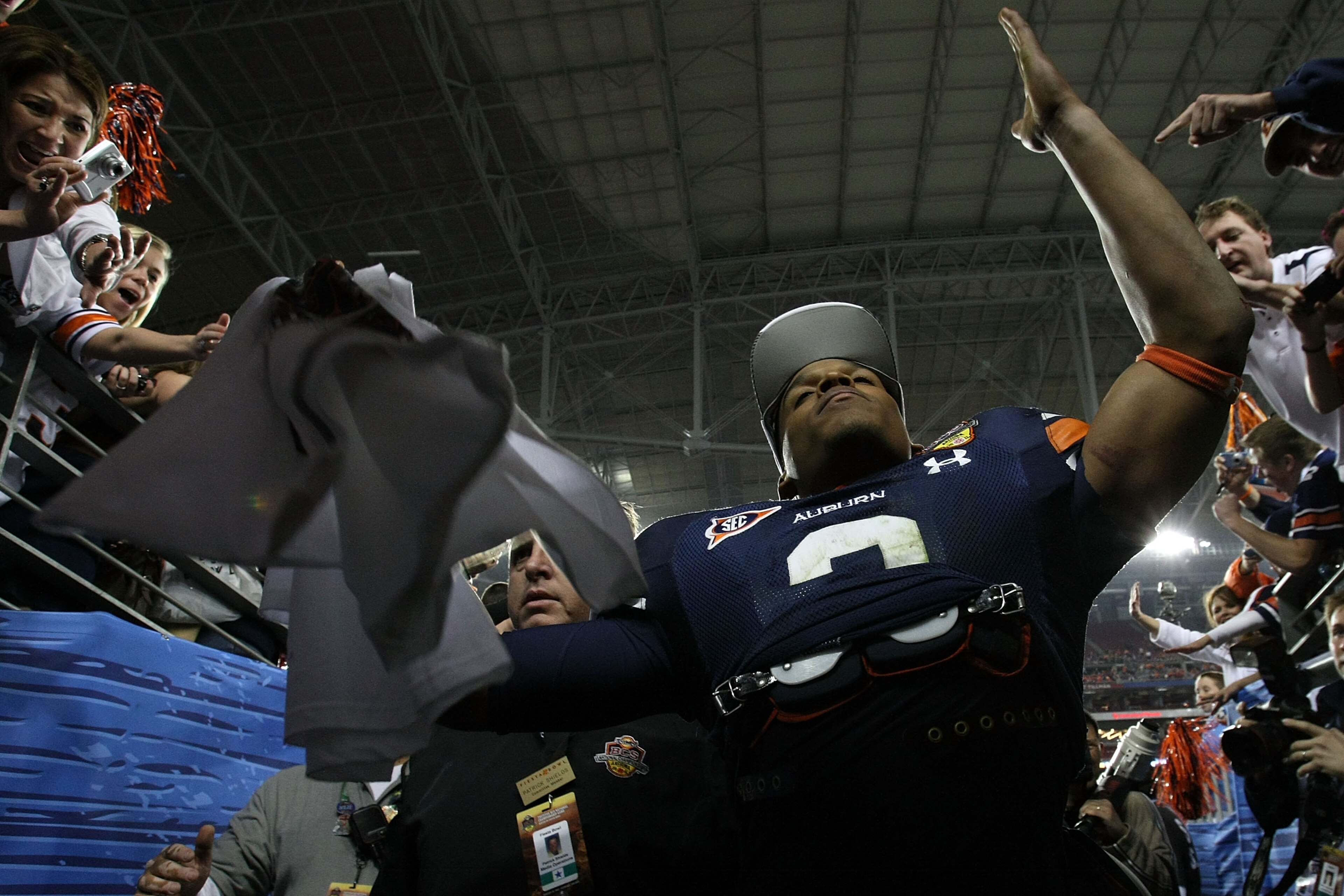 GLENDALE, AZ - JANUARY 10:  Quarterback Cameron Newton #2 of the Auburn Tigers celebrates the Tigers 22-19 victory against the Oregon Ducks in the Tostitos BCS National Championship Game at University of Phoenix Stadium on January 10, 2011 in Glendale, Ar
