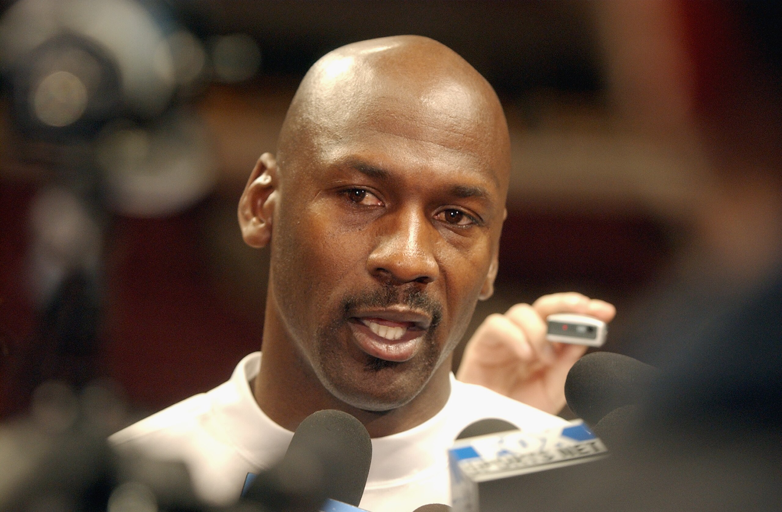 CHICAGO - JANUARY 24:  Michael Jordan #23 of the Washington Wizards talks to the press before Jordan's last appearance against his old team the Chicago Bulls at the United Center on January 24, 2003 in Chicago, Illinois.  The Bulls won 104-97.  The Bulls