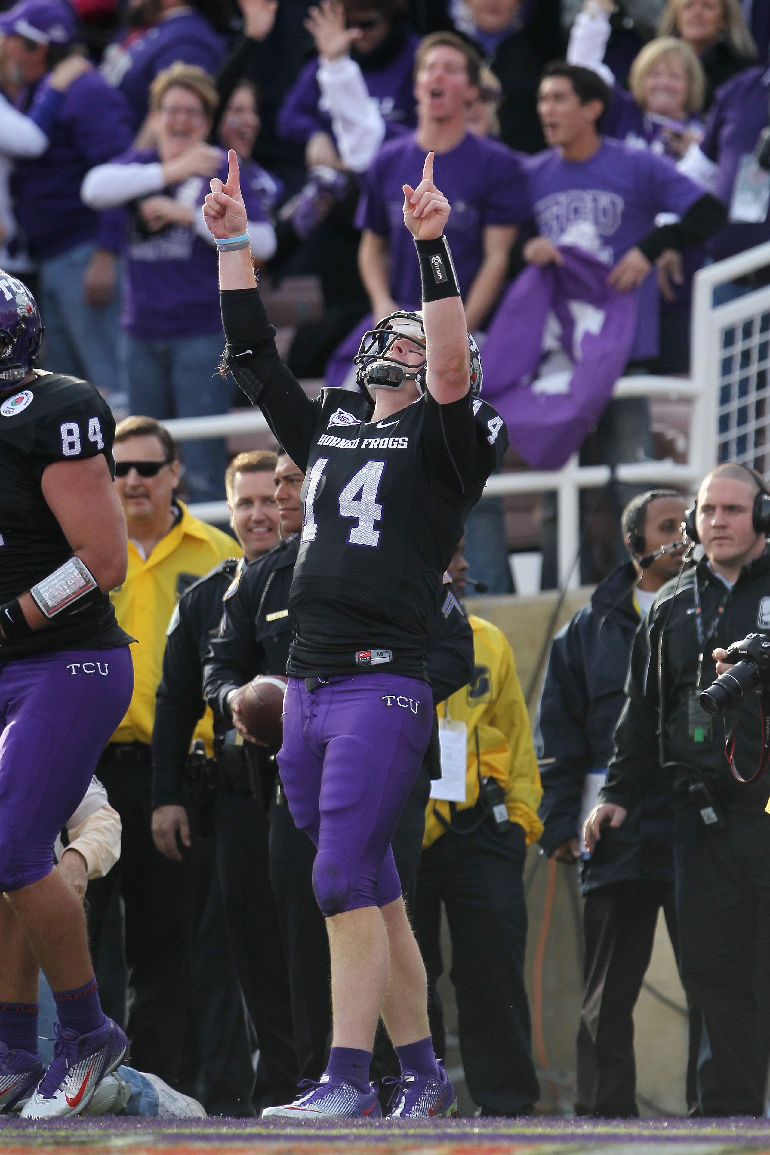 PASADENA, CA - JANUARY 01: Quarterback Andy Dalton #14 of the TCU Horned Frogs celebrates after a touchdown against the Wisconsin Badgers in the first quarter of the 97th Rose Bowl game on January 1, 2011 in Pasadena, California. (Photo by Jeff Gross/Ge PASADENA, CA - JANUARY 01: Quarterback Andy Dalton #14 of the TCU Horned Frogs celebrates after a touchdown against the Wisconsin Badgers in the first quarter of the 97th Rose Bowl game on January 1, 2011 in Pasadena, California. (Photo by Jeff Gross/Ge
