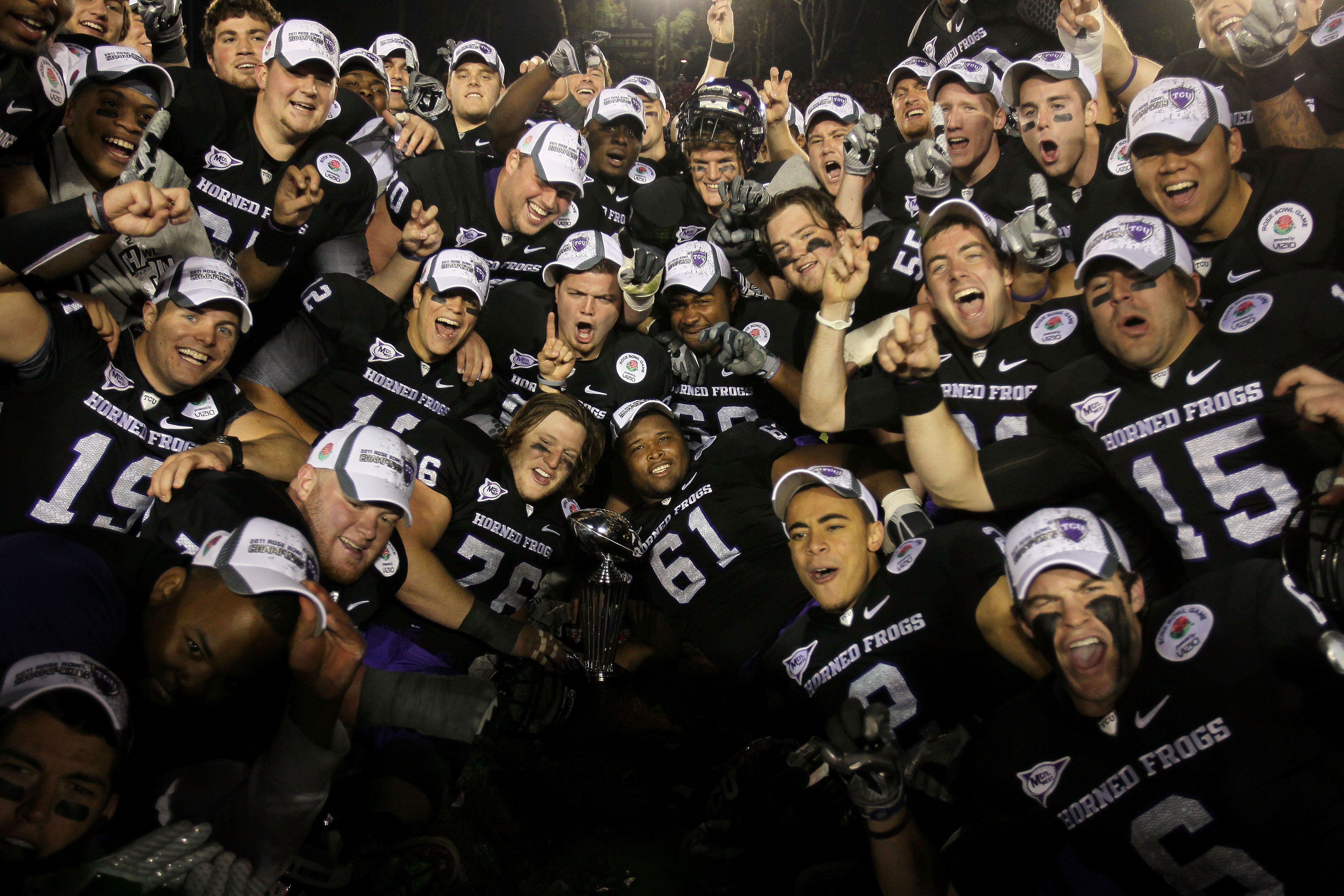 PASADENA, CA - JANUARY 01:  The TCU Horned Frogs celebrate after defeating the Wisconsin Badgers 21-19 in the 97th Rose Bowl game on January 1, 2011 in Pasadena, California.  (Photo by Jeff Gross/Getty Images)