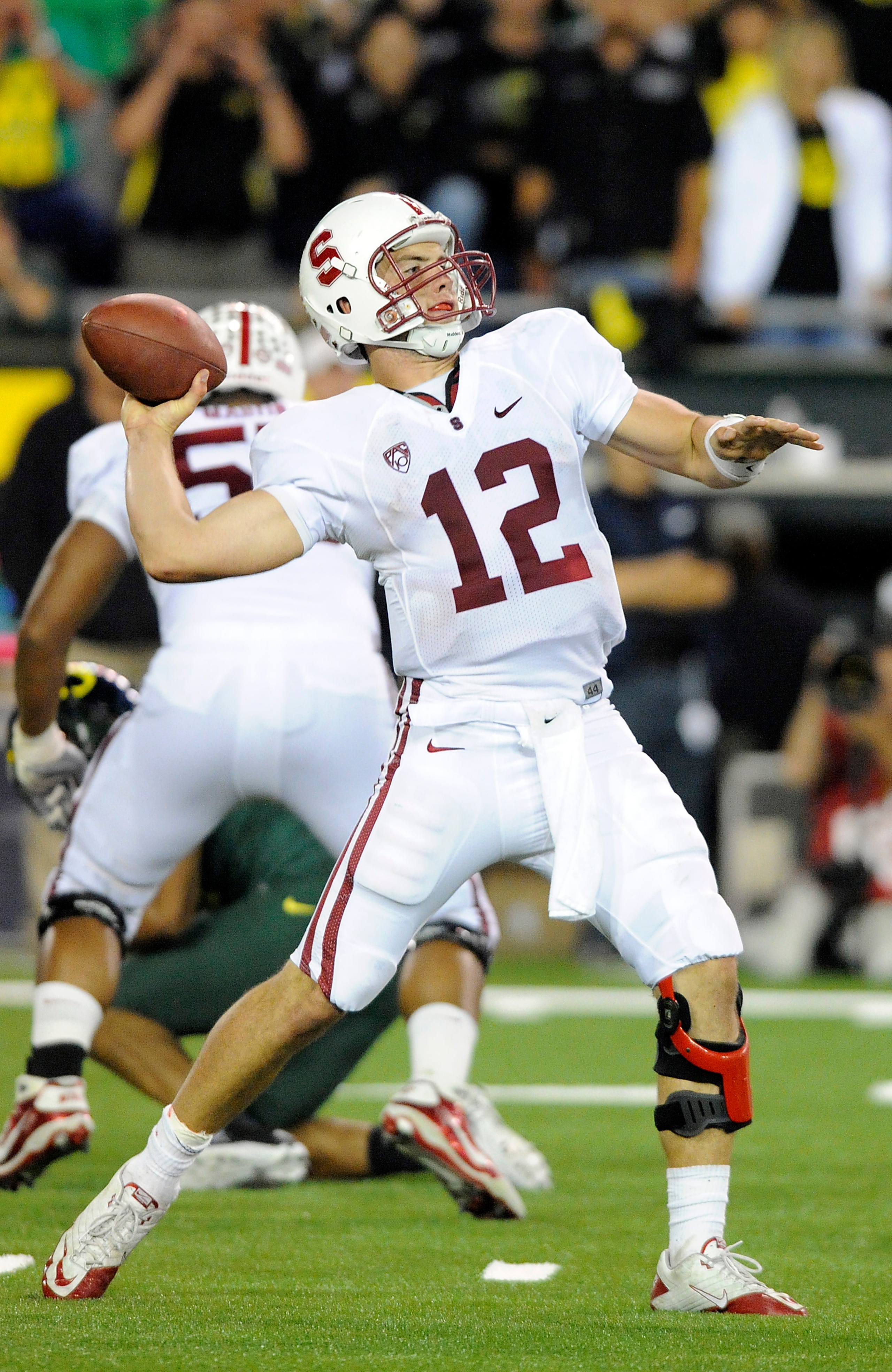EUGENE, OR - OCTOBER 2: Quarterback Andrew Luck #12 of the Stanford Cardinal passes the ball in the third quarter of the game against the Oregon Ducks at Autzen Stadium on October 2, 2010 in Eugene, Oregon. Oregon won the game 52-31. (Photo by Steve Dykes EUGENE, OR - OCTOBER 2: Quarterback Andrew Luck #12 of the Stanford Cardinal passes the ball in the third quarter of the game against the Oregon Ducks at Autzen Stadium on October 2, 2010 in Eugene, Oregon. Oregon won the game 52-31. (Photo by Steve Dykes