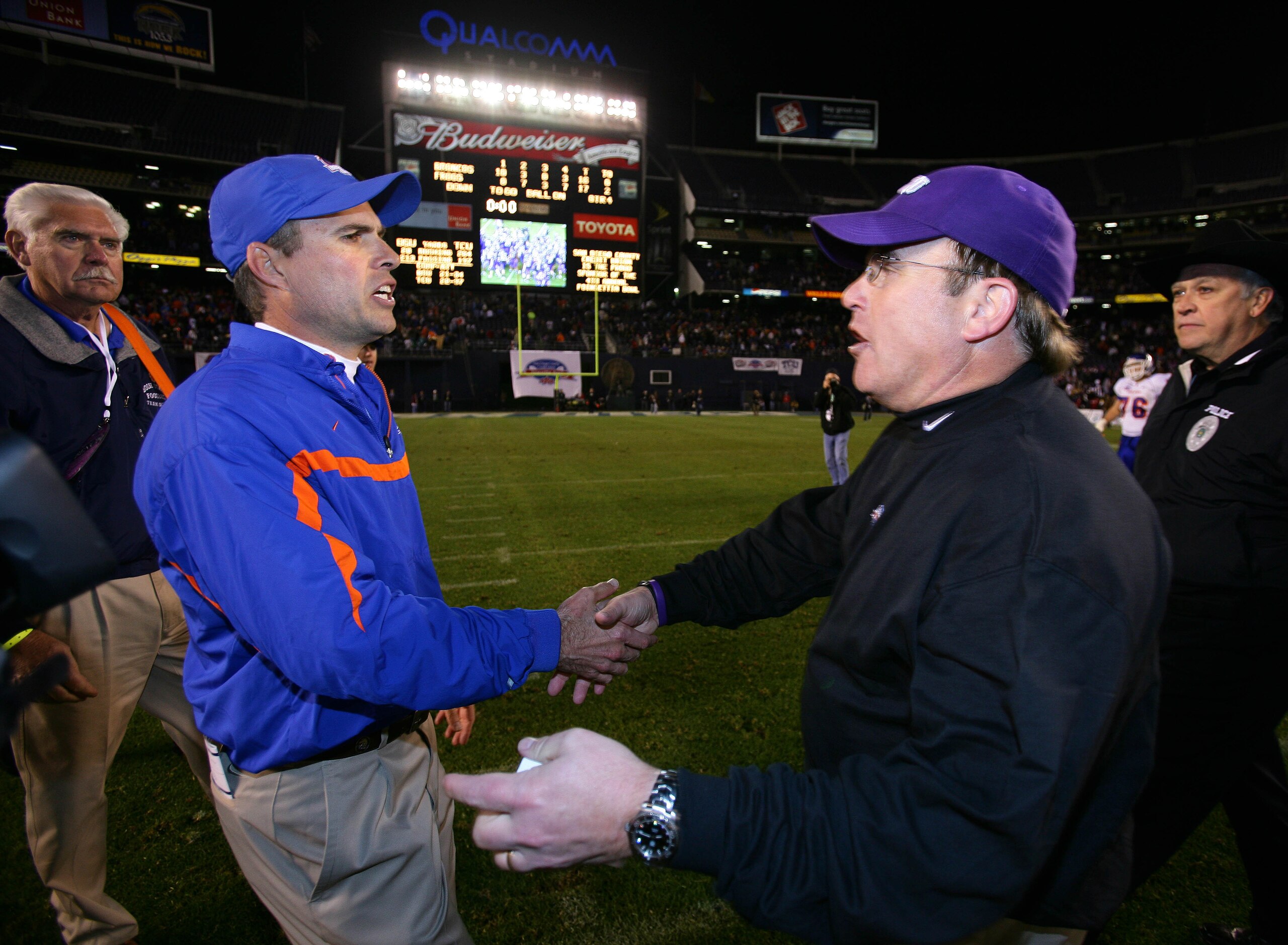 SAN DIEGO, CA - DECEMBER 23: Head Coach Chris Petersen of the Boise State Broncos meets Heads Coach Gary Patterson of TCU Horned Frogs after the Horned Frogs 17-16 win over the Broncos during the San Diego County Credit Union Poinsettia Bowl at Qualcomm SAN DIEGO, CA - DECEMBER 23: Head Coach Chris Petersen of the Boise State Broncos meets Heads Coach Gary Patterson of TCU Horned Frogs after the Horned Frogs 17-16 win over the Broncos during the San Diego County Credit Union Poinsettia Bowl at Qualcomm