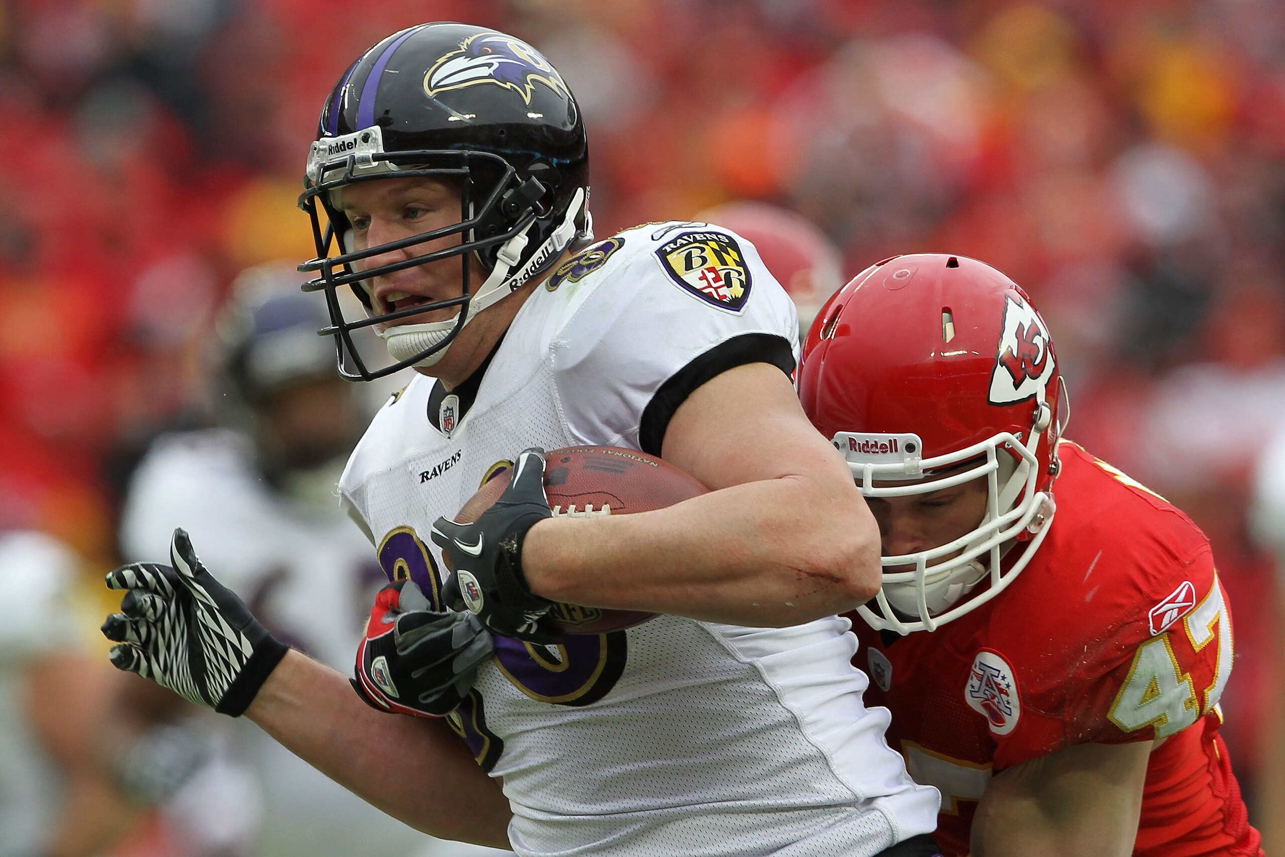 KANSAS CITY, MO - JANUARY 09:  Tight end Todd Heap #86 of the Baltimore Ravens runs for a first down in the second quarter of their 2011 AFC wild card playoff game against the Kansas City Chiefs at Arrowhead Stadium on January 9, 2011 in Kansas City, Miss