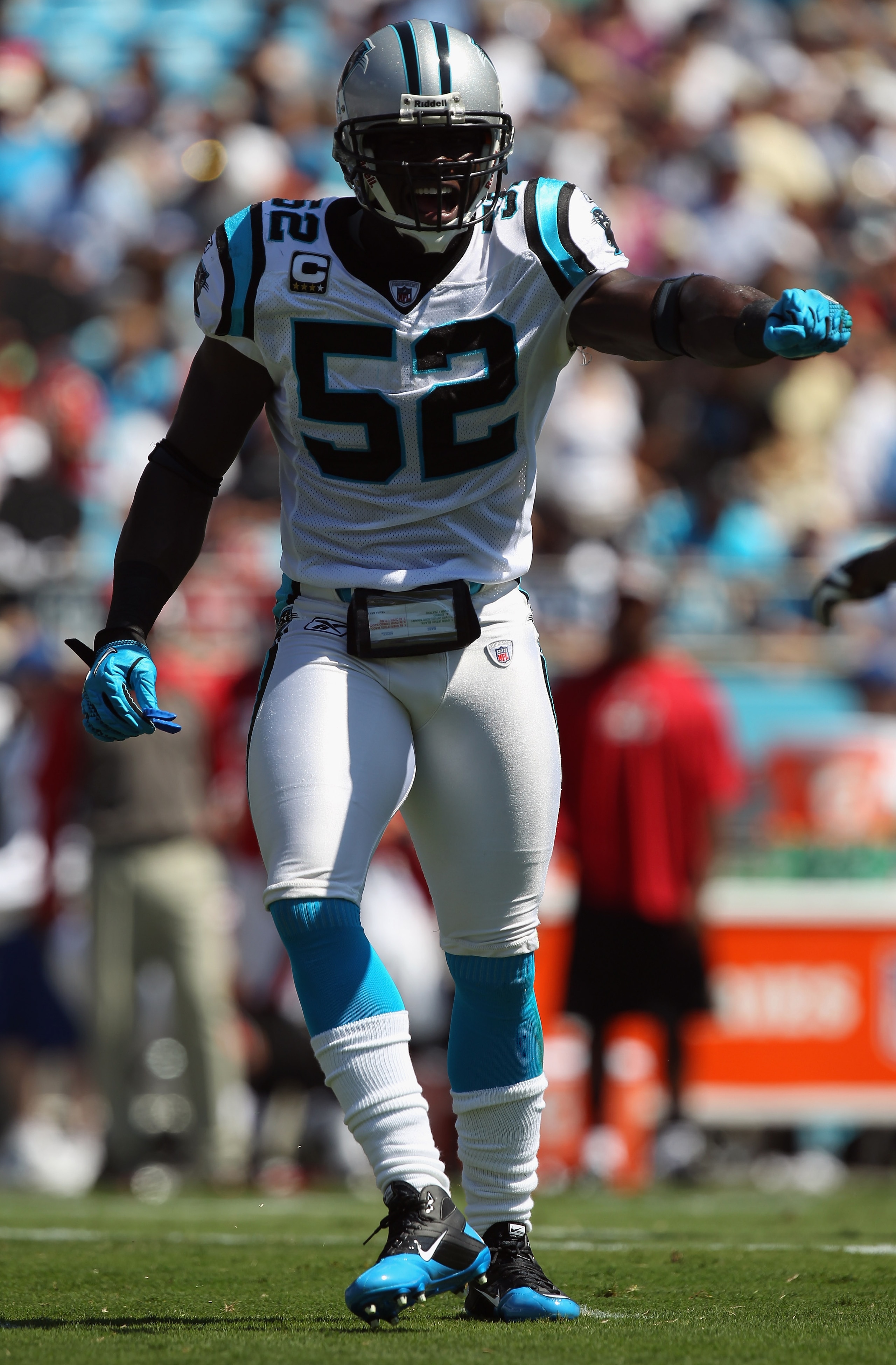 CHARLOTTE, NC - SEPTEMBER 19:  Jon Beason #52 of the Carolina Panthers yells to his teammates during their game against the Tampa Bay Buccaneers at Bank of America Stadium on September 19, 2010 in Charlotte, North Carolina.  (Photo by Streeter Lecka/Getty