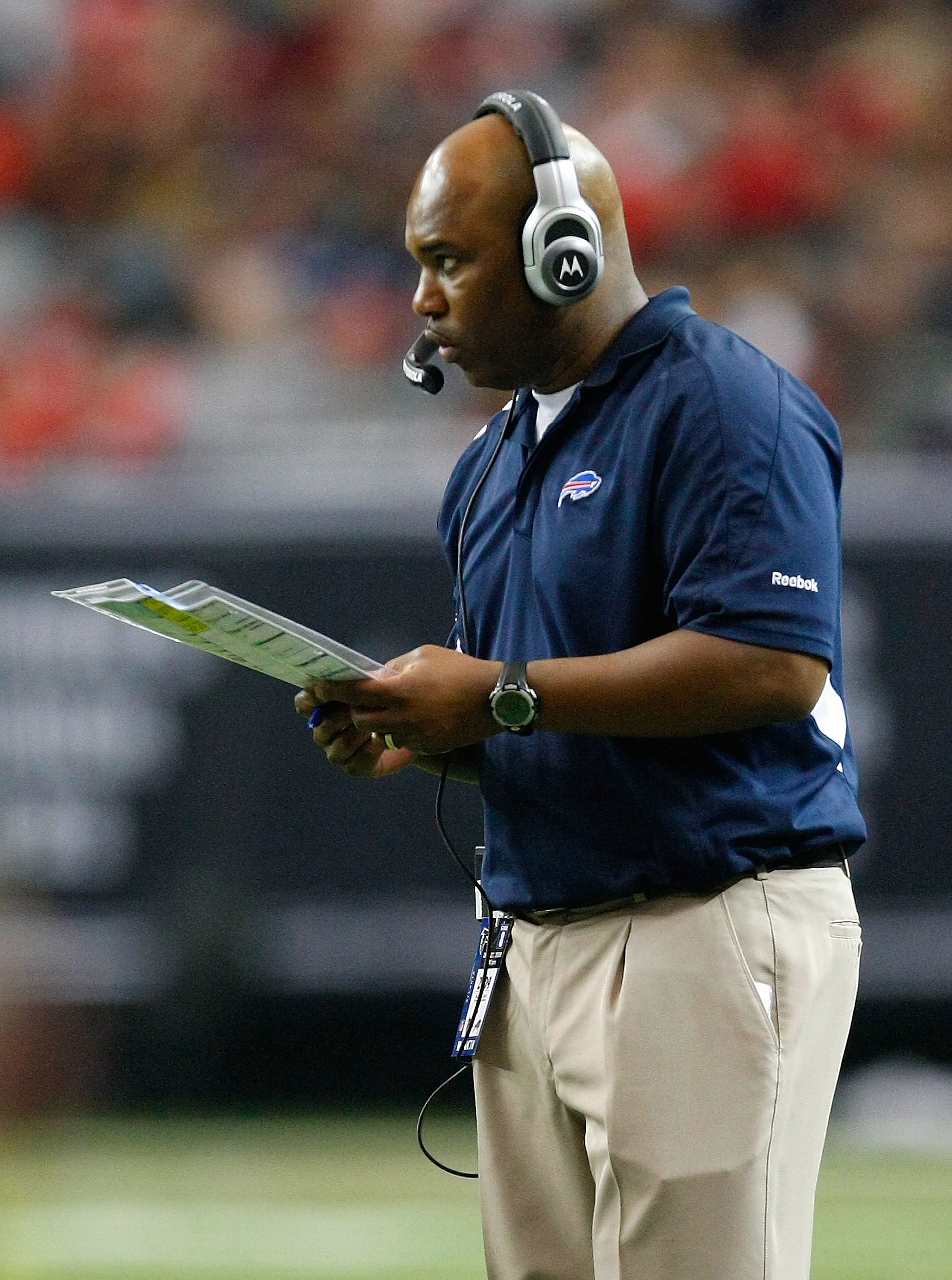 Carolina Panther head coach John Fox watches replay in Jacksonville