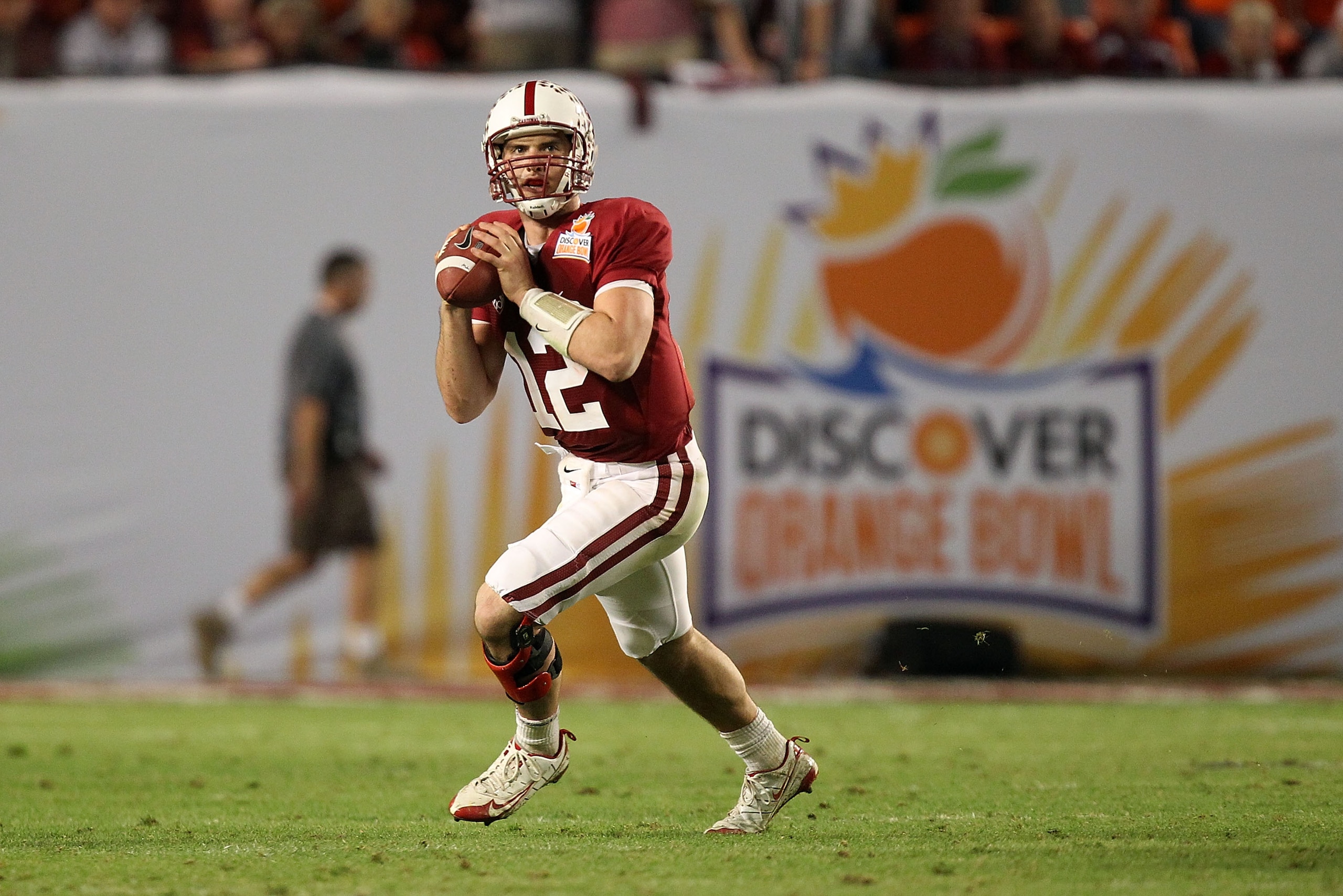 MIAMI, FL - JANUARY 03: Andrew Luck #12 of the Stanford Cardinal rolls out of the pocket to pass against the Virginia Tech Hokies during the 2011 Discover Orange Bowl at Sun Life Stadium on January 3, 2011 in Miami, Florida. (Photo by Streeter Lecka/Getty