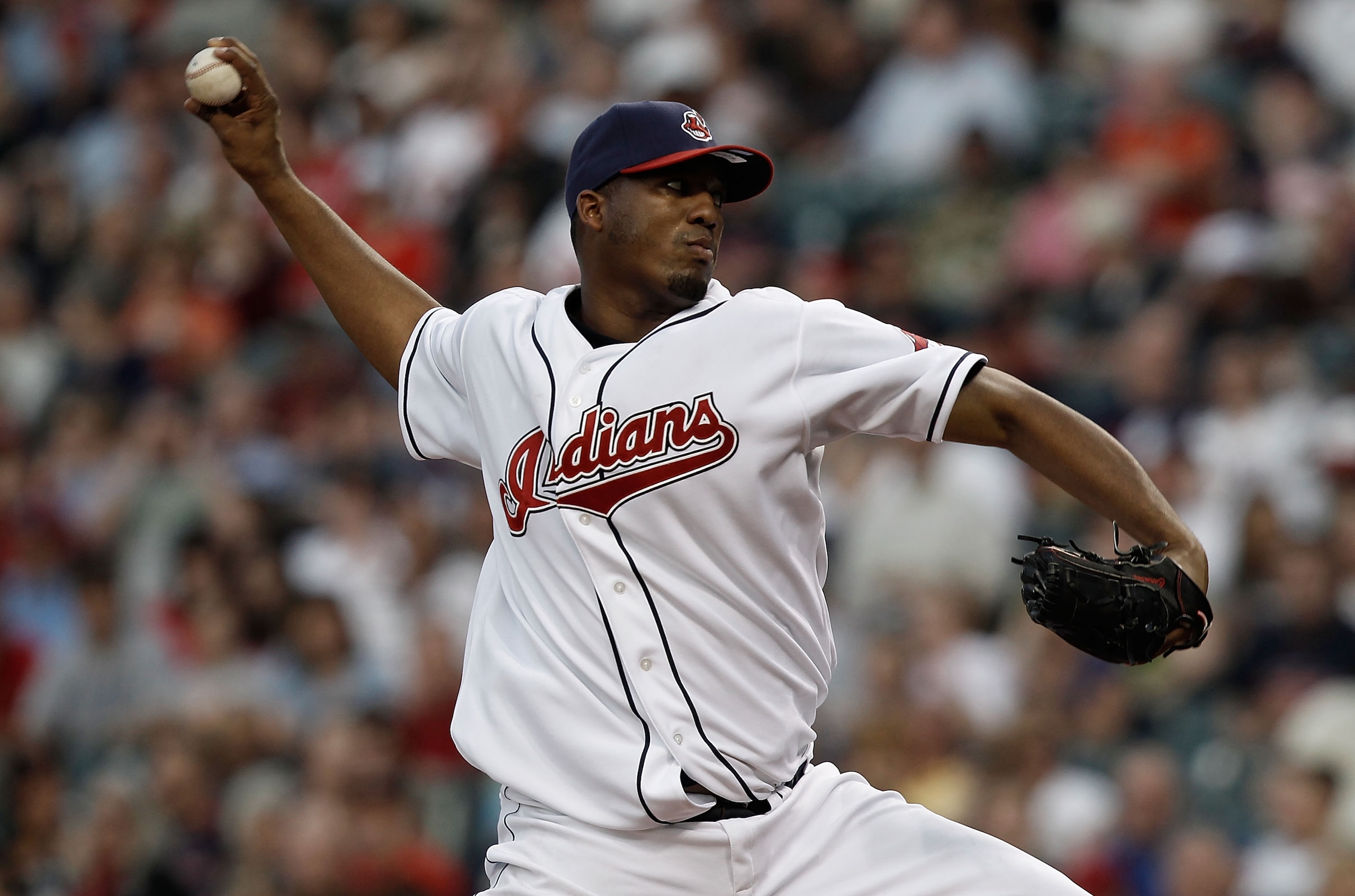 CLEVELAND - APRIL 30:  Fausto Carmona # 55 of the Cleveland Indians pitches against the Minnesota Twins during the game on April 30, 2010 at Progressive Field in Cleveland, Ohio.  (Photo by Jared Wickerham/Getty Images)