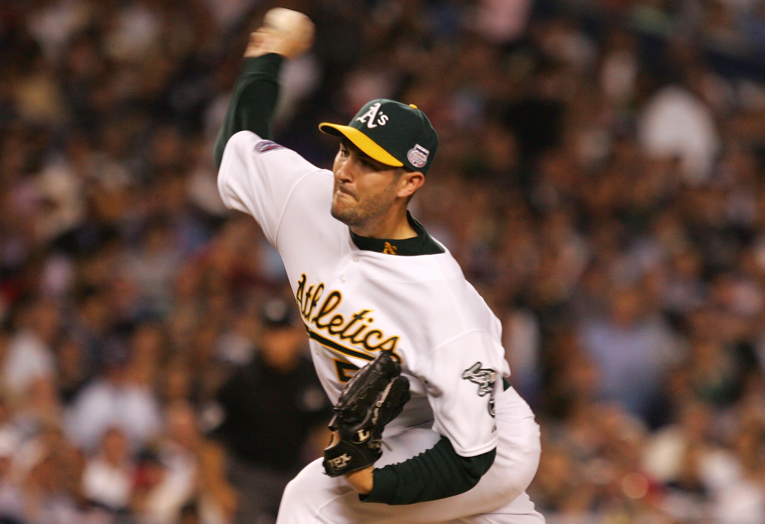 NEW YORK - JULY 15:  American League All-Star Justin Duchscherer #58 of the Oakland A's pitches during the 79th MLB All-Star Game at Yankee Stadium on July 15, 2008 in the Bronx borough of New York City.  (Photo by Jim McIsaac/Getty Images)