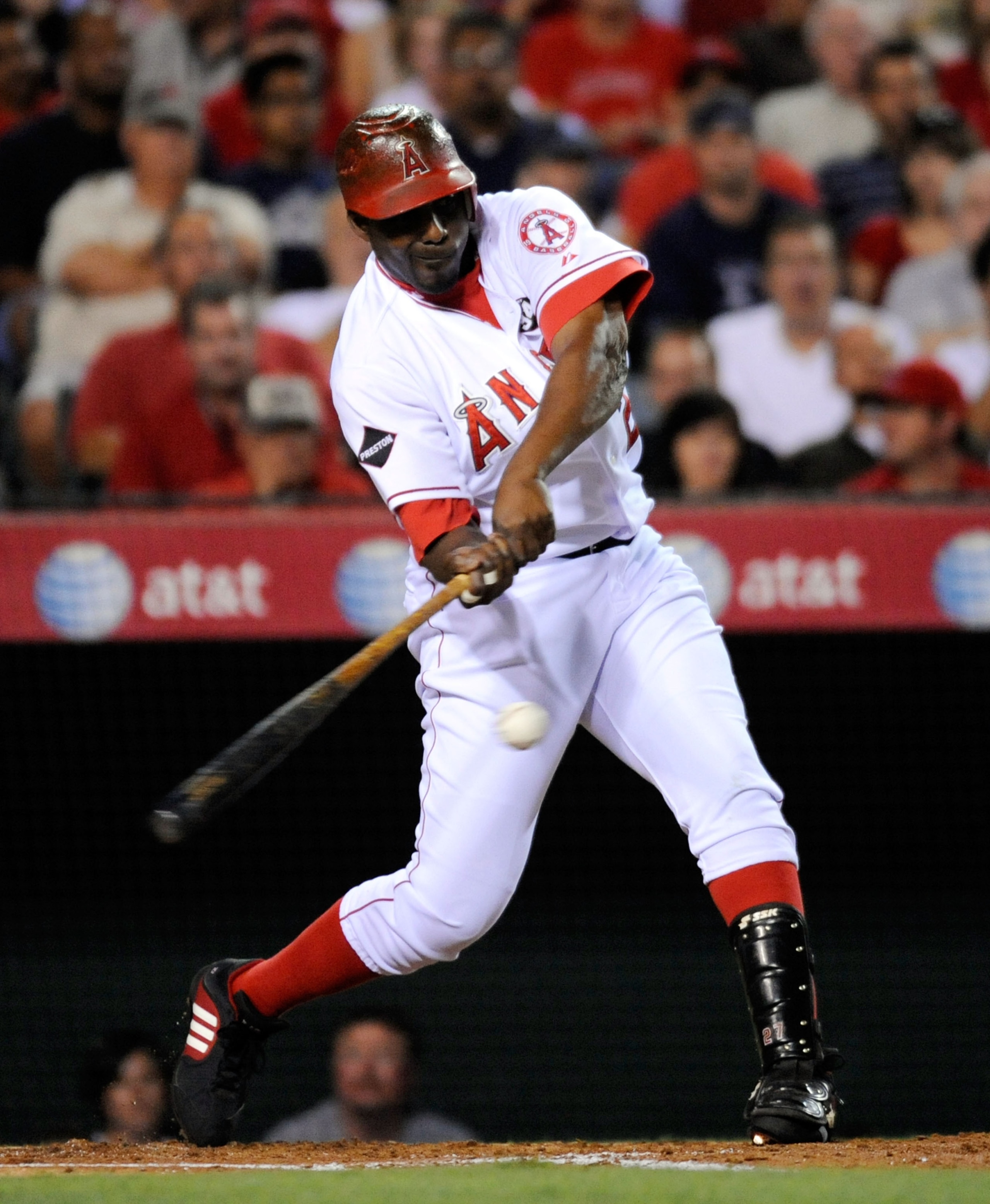 ANAHEIM, CA - SEPTEMBER 21:   Vladimir Guerrero #27 of the Los Angeles Angels of Anaheim hits a double to score Bobby Abreu during action against the New York Yankees in the first inning on September 21, 2009 in Anaheim, California.  (Photo by Kevork Djan