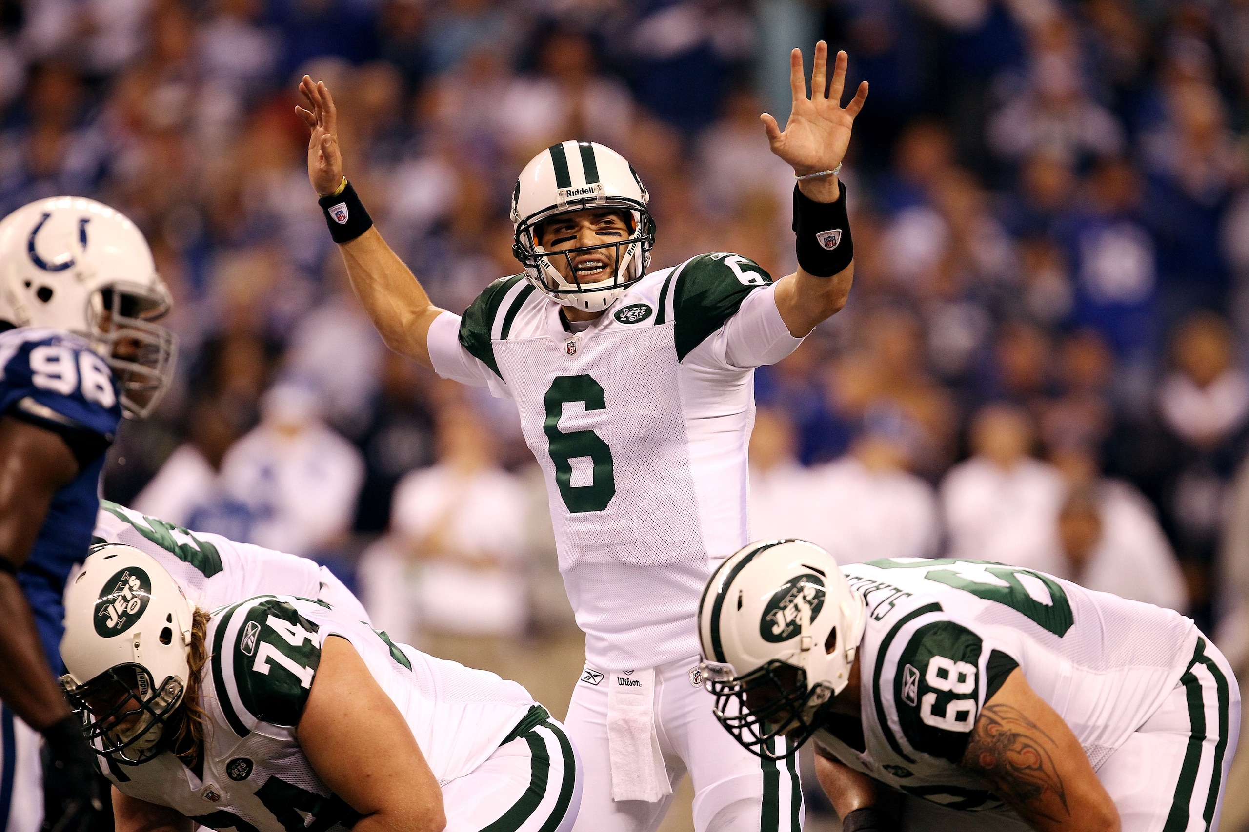 INDIANAPOLIS, IN - JANUARY 08: Quarterback Mark Sanchez #6 of the New York Jets gestures as he steps to the line of scrimmage against the Indianapolis Colts during their 2011 AFC wild card playoff game at Lucas Oil Stadium on January 8, 2011 in Indianapo INDIANAPOLIS, IN - JANUARY 08: Quarterback Mark Sanchez #6 of the New York Jets gestures as he steps to the line of scrimmage against the Indianapolis Colts during their 2011 AFC wild card playoff game at Lucas Oil Stadium on January 8, 2011 in Indianapo