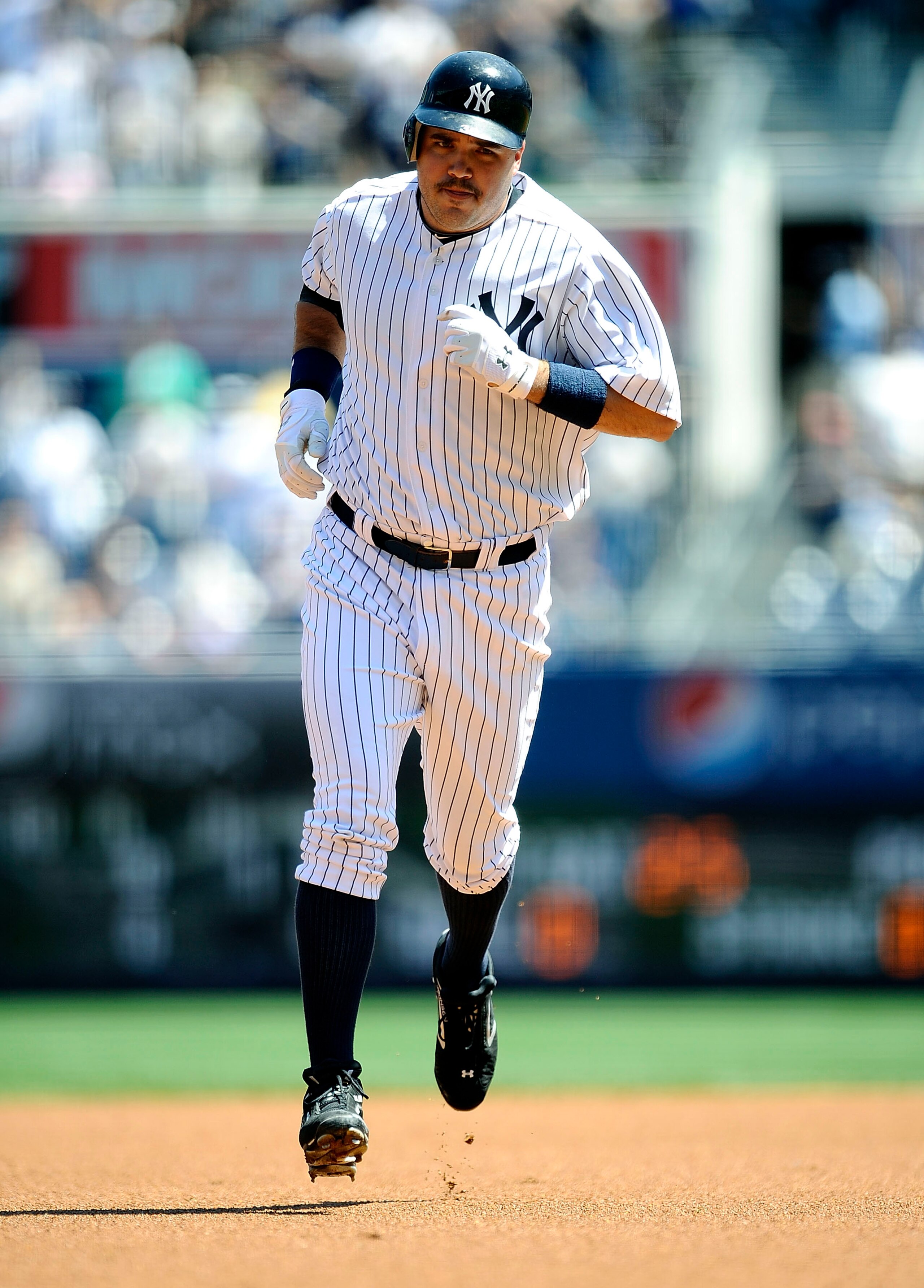 NEW YORK - MAY 05:  Nick Johnson #36 of the New York Yankees rounds the bases on a solo home run against the Baltimore Orioles at Yankee Stadium on May 5, 2010 in the Bronx borough of New York City  (Photo by Jeff Zelevansky/Getty Images)