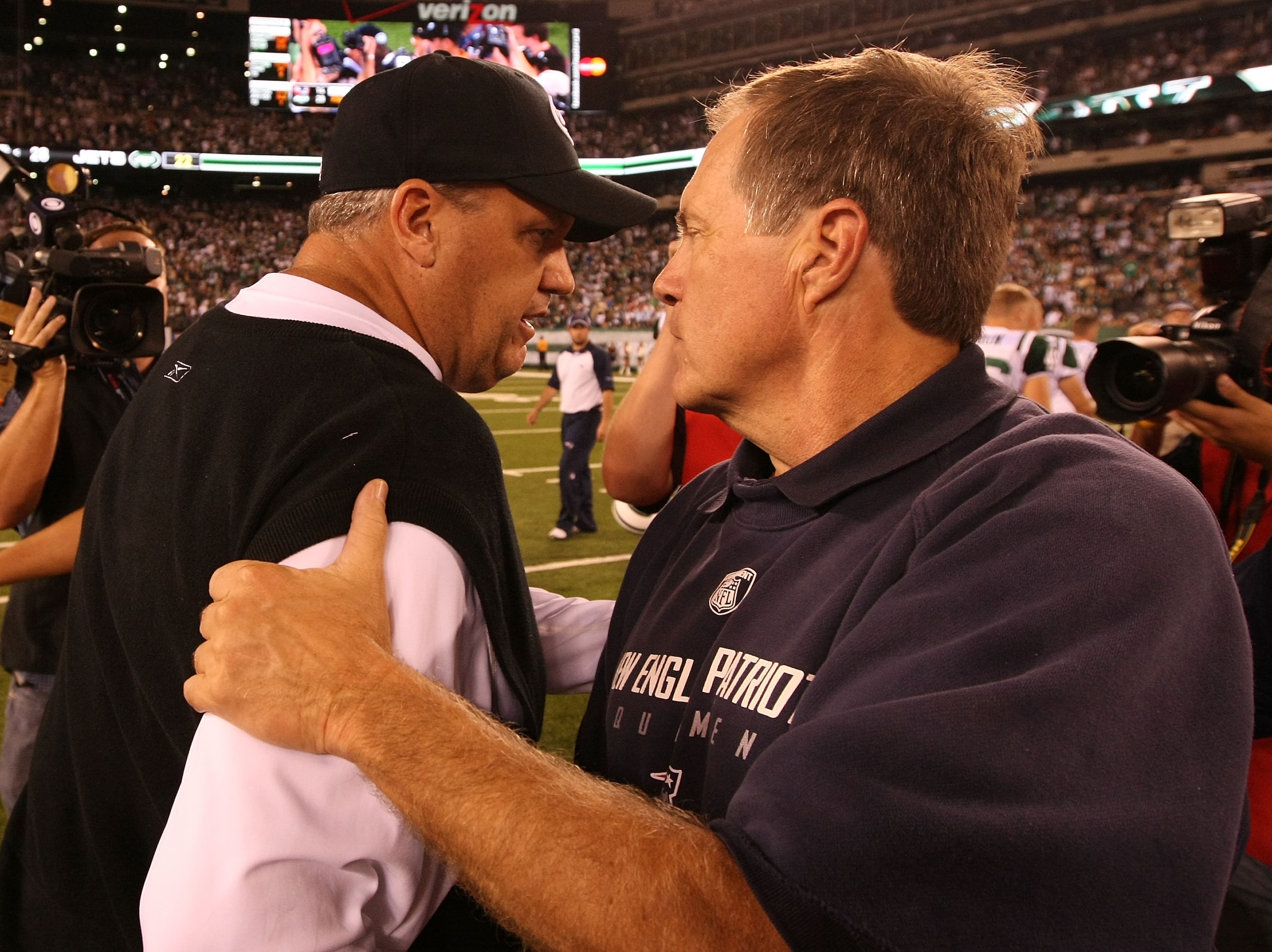 EAST RUTHERFORD, NJ - SEPTEMBER 19: Rex Ryan, Head Coach of the New York Jets greets Bill Belichick, head coach of the New England Patriots after a Jets 28-14 win on September 19, 2010 at the New Meadowlands Stadium in East Rutherford, New Jersey. (Pho EAST RUTHERFORD, NJ - SEPTEMBER 19: Rex Ryan, Head Coach of the New York Jets greets Bill Belichick, head coach of the New England Patriots after a Jets 28-14 win on September 19, 2010 at the New Meadowlands Stadium in East Rutherford, New Jersey. (Pho
