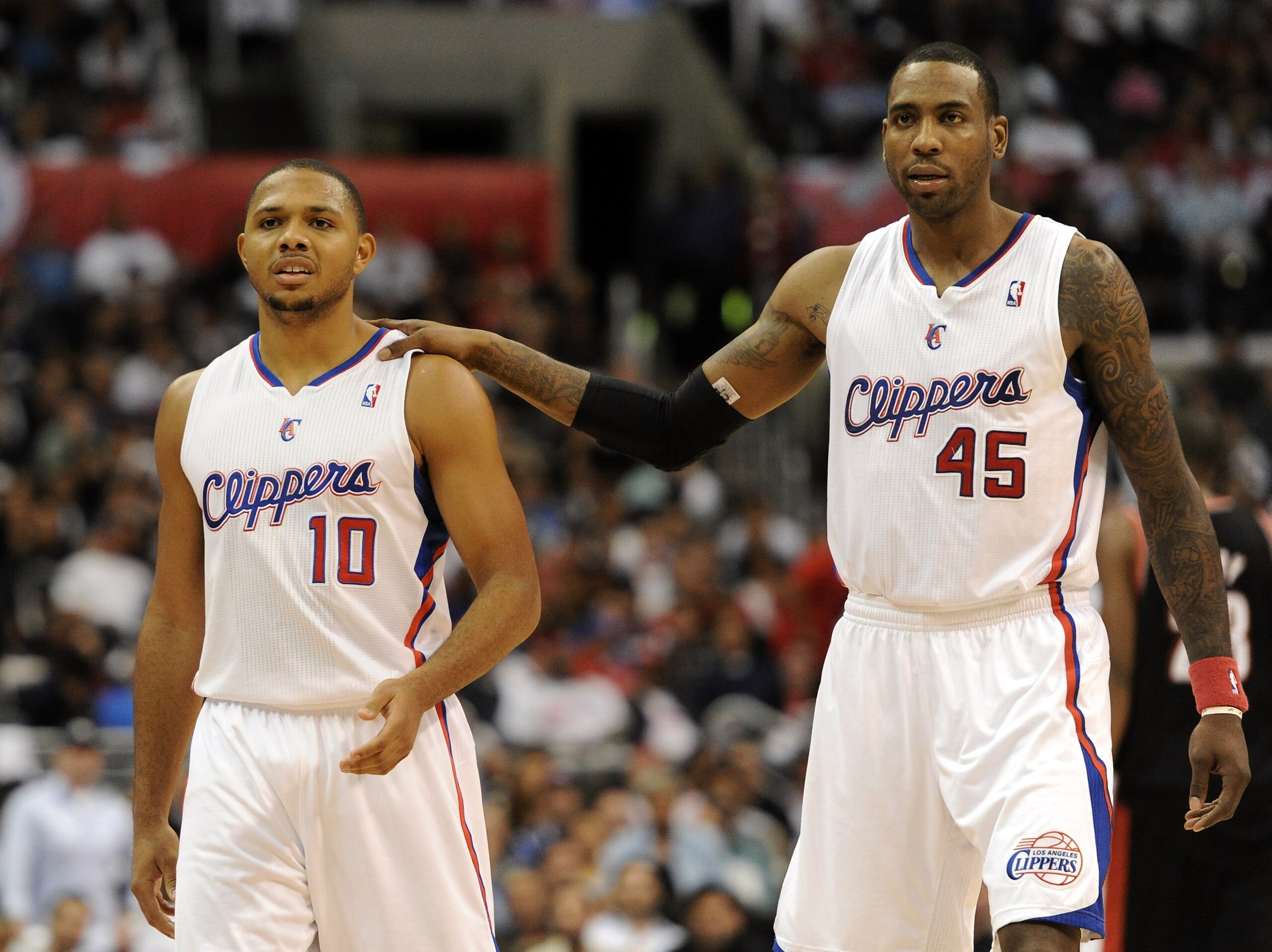 LOS ANGELES, CA - OCTOBER 27:  Eric Gordon #10 is consoled by Rasual Butler #45 of the Los Angeles Clippers after a technical foul against the Portland Trail Blazers at Staples Center on October 27, 2010 in Los Angeles, California. The Clippers lost 98-88