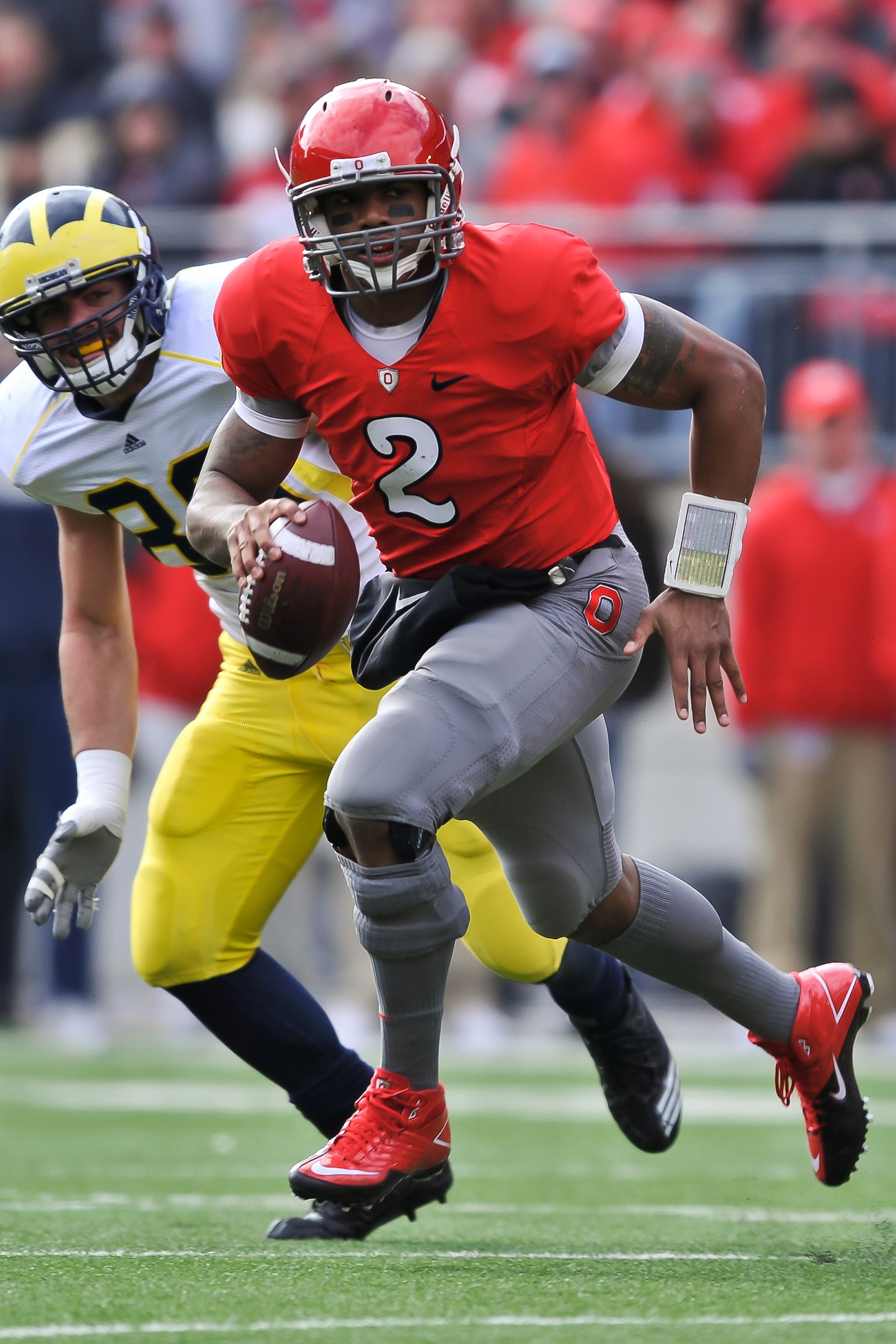 COLUMBUS, OH - NOVEMBER 27:  Quarterback Terrelle Pryor #2 of the Ohio State Buckeyes rolls out of the pocket against the Michigan Wolverines at Ohio Stadium on November 27, 2010 in Columbus, Ohio.  (Photo by Jamie Sabau/Getty Images)