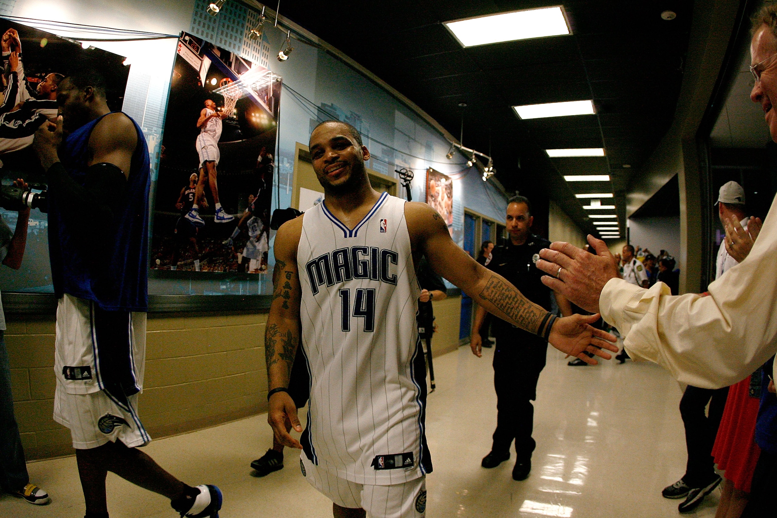 ORLANDO, FL - MAY 26:  Jammer Nelson #14 of the Orlando Magic celebrates as he walks back to the locker room after the Magic won 113-92 against the Boston Celtics in Game Five of the Eastern Conference Finals during the 2010 NBA Playoffs at Amway Arena on
