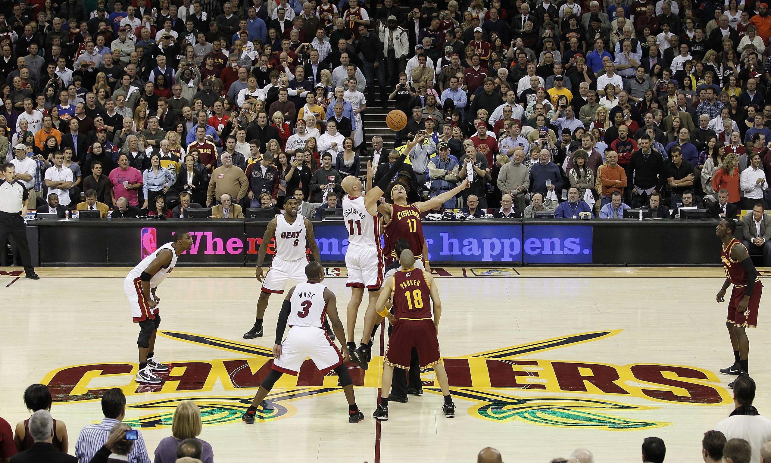 CLEVELAND, OH - DECEMBER 02:  Anderson Varejao #17 of the Cleveland Cavaliers jumps for the opening tip against Zydrunas Ilgauskas #11 of the Miami Heat with LeBron James #6 looking on at Quicken Loans Arena on December 2, 2010 in Cleveland, Ohio. NOTE TO