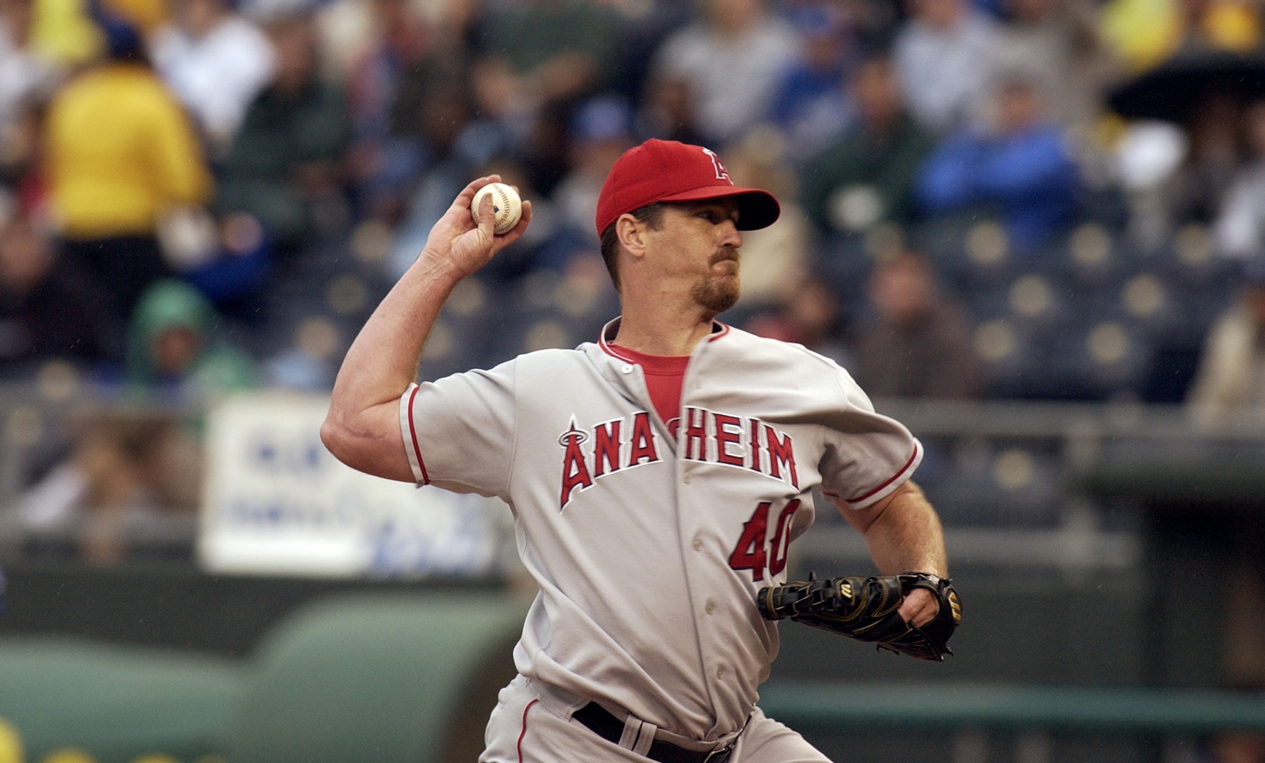 KANSAS CITY, MO - AUGUST 31:  Troy Percival #40 of the Anaheim Angels throws against the Kansas City Royals in the ninth inning of the game on August 31, 2003 at Kauffman Stadium in Kansas City, Missouri.  Percival retired the two batters he faced to earn