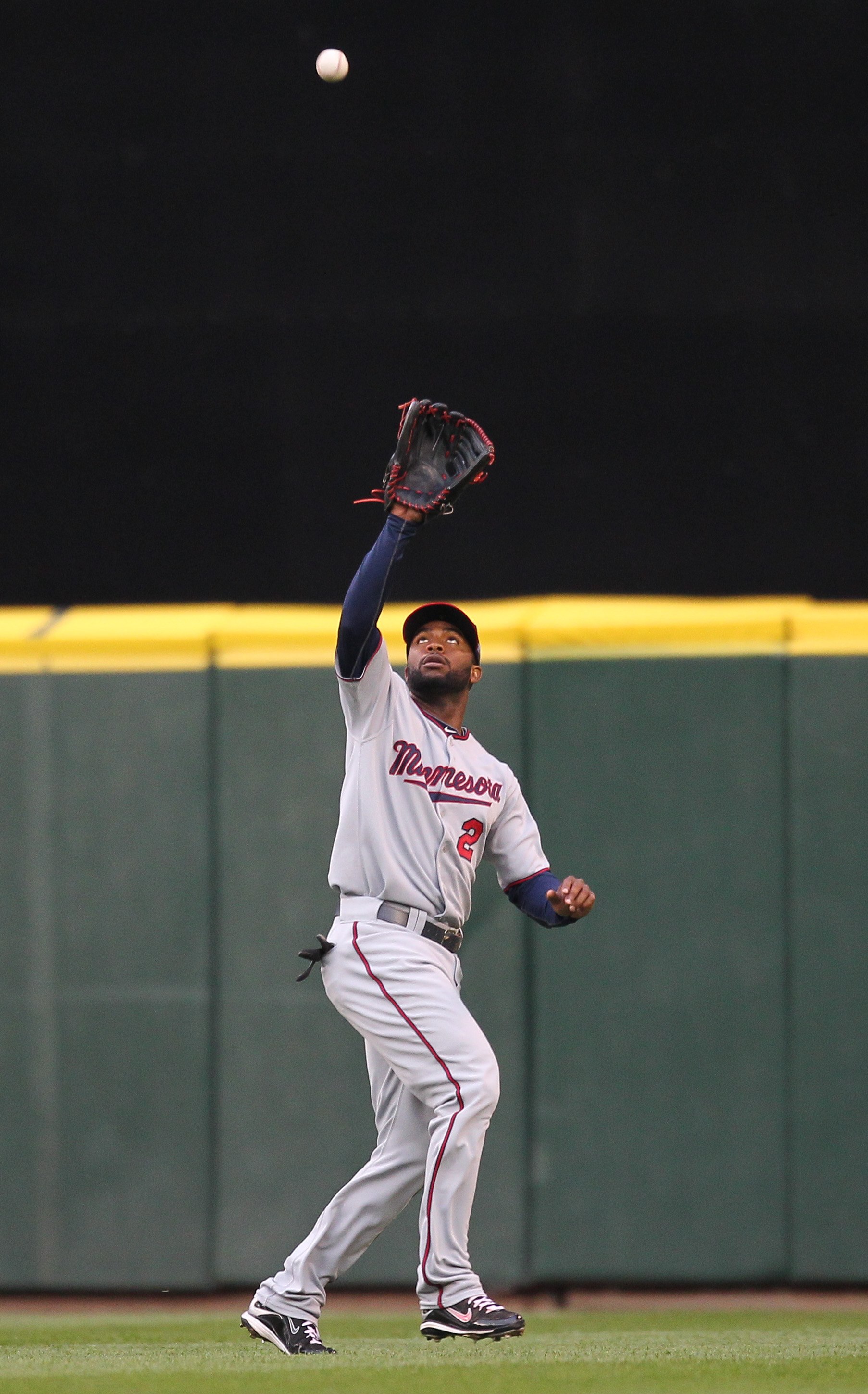 SEATTLE - JUNE 02:  Center fielder Denard Span #2 of the Minnesota Twins makes a catch against the Seattle Mariners at Safeco Field on June 2, 2010 in Seattle, Washington. (Photo by Otto Greule Jr/Getty Images)