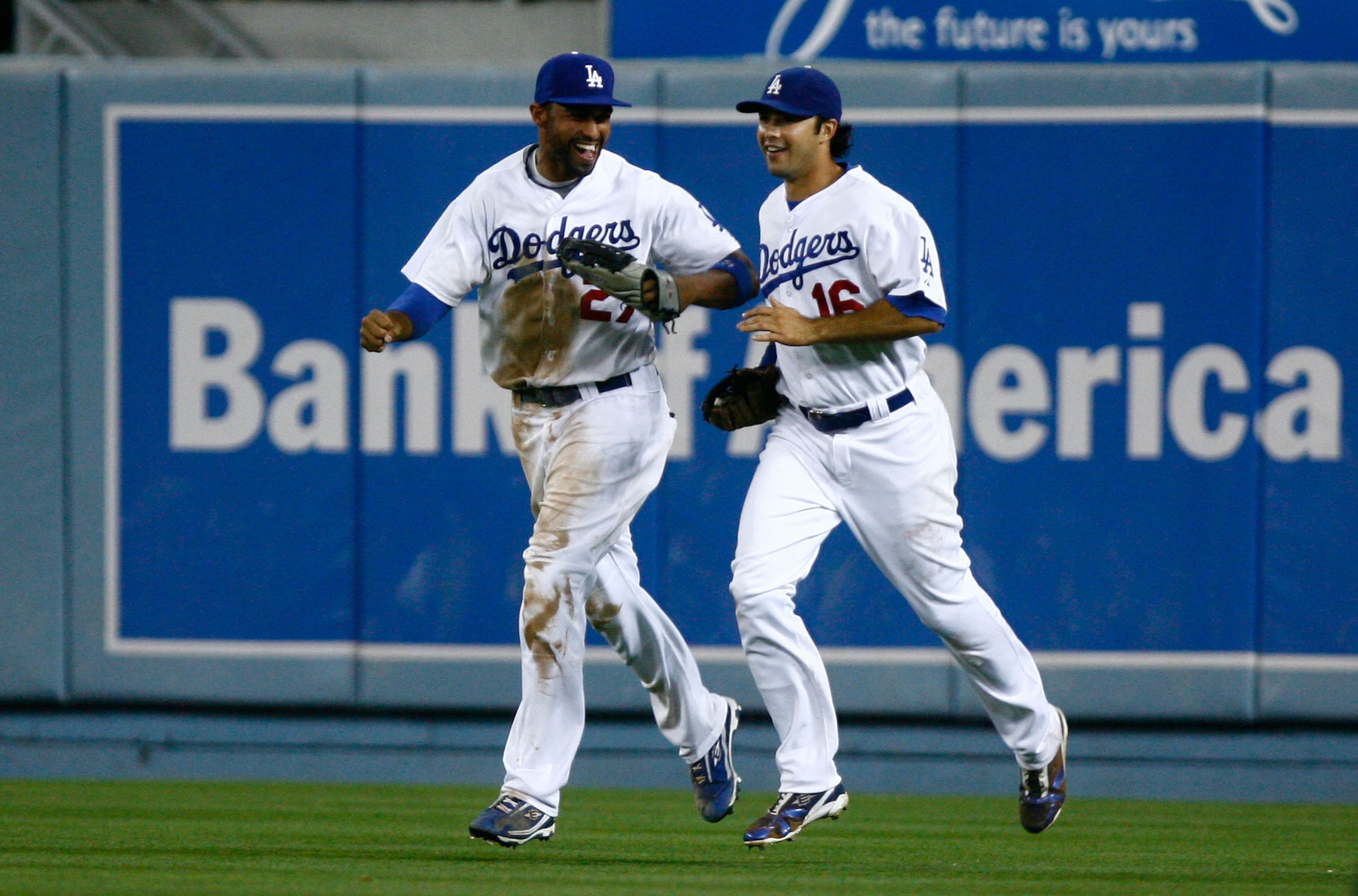 LOS ANGELES, CA - SEPTEMBER 01: Matt Kemp (L) #27 and Andre Ethier #16 of the Los Angeles Dodgers share a laugh after Ethier's catch at the wall on a ball hit by Brandon Allen of the Arizona Diamondbacks in the eighth inning at Dodger Stadium on Septembe LOS ANGELES, CA - SEPTEMBER 01: Matt Kemp (L) #27 and Andre Ethier #16 of the Los Angeles Dodgers share a laugh after Ethier's catch at the wall on a ball hit by Brandon Allen of the Arizona Diamondbacks in the eighth inning at Dodger Stadium on Septembe
