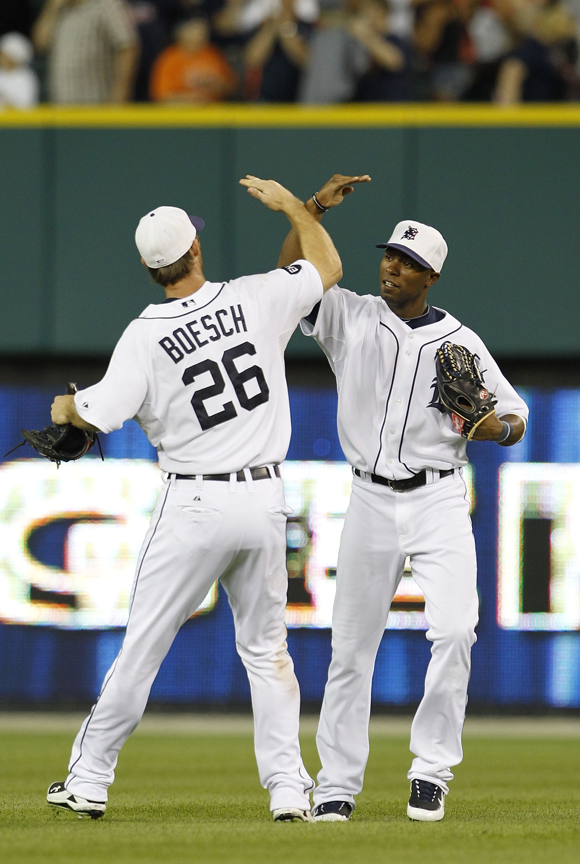 DETROIT - JULY 02: Brennan Boesch #26 and Austin Jackson #14 of the Detroit Tigers celebrate a 7-1 win over the Seattle Marines on July 2, 2010 at Comerica Park in Detroit, Michigan. (Photo by Leon Halip/Getty Images)