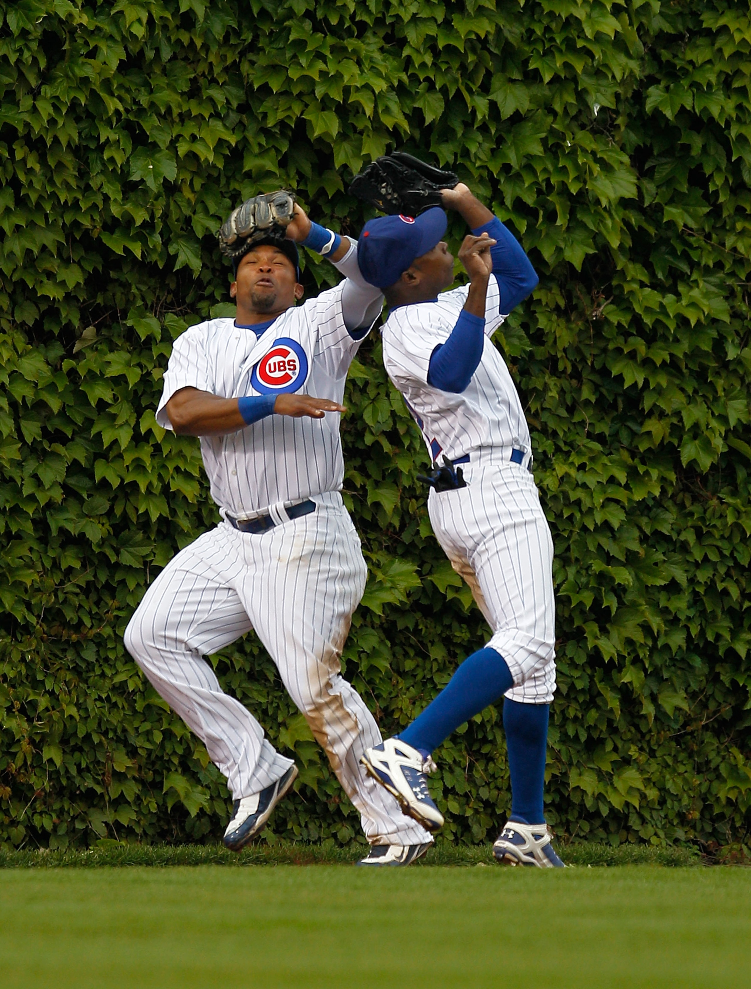 CHICAGO - MAY 12: Marlon Byrd #24 (L) and teammate Alfonso Soriano #12 of the Chicago Cubs avoid a collision in the outfield as Soriano makes the catch against the Florida Marlins at Wrigley Field on May 12, 2010 in Chicago, Illinois. (Photo by Jonathan D CHICAGO - MAY 12: Marlon Byrd #24 (L) and teammate Alfonso Soriano #12 of the Chicago Cubs avoid a collision in the outfield as Soriano makes the catch against the Florida Marlins at Wrigley Field on May 12, 2010 in Chicago, Illinois. (Photo by Jonathan D