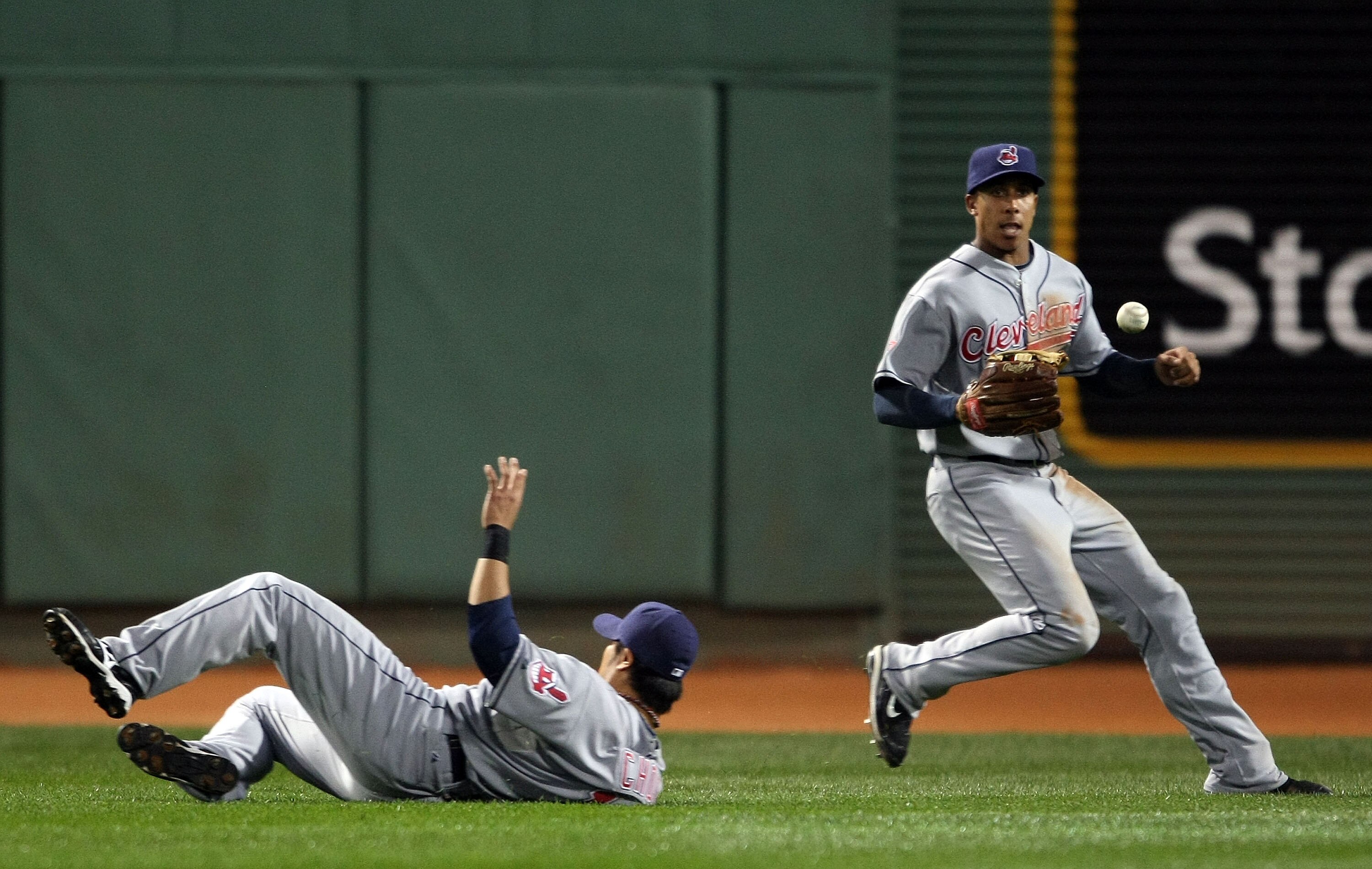 BOSTON - OCTOBER 02:  Michael Brantley #23 of the Cleveland Indians chases after the ball that Shin-Soo Choo #17 missed against the Boston Red Sox on October 2, 2009 at Fenway Park in Boston, Massachusetts.  (Photo by Elsa/Getty Images)