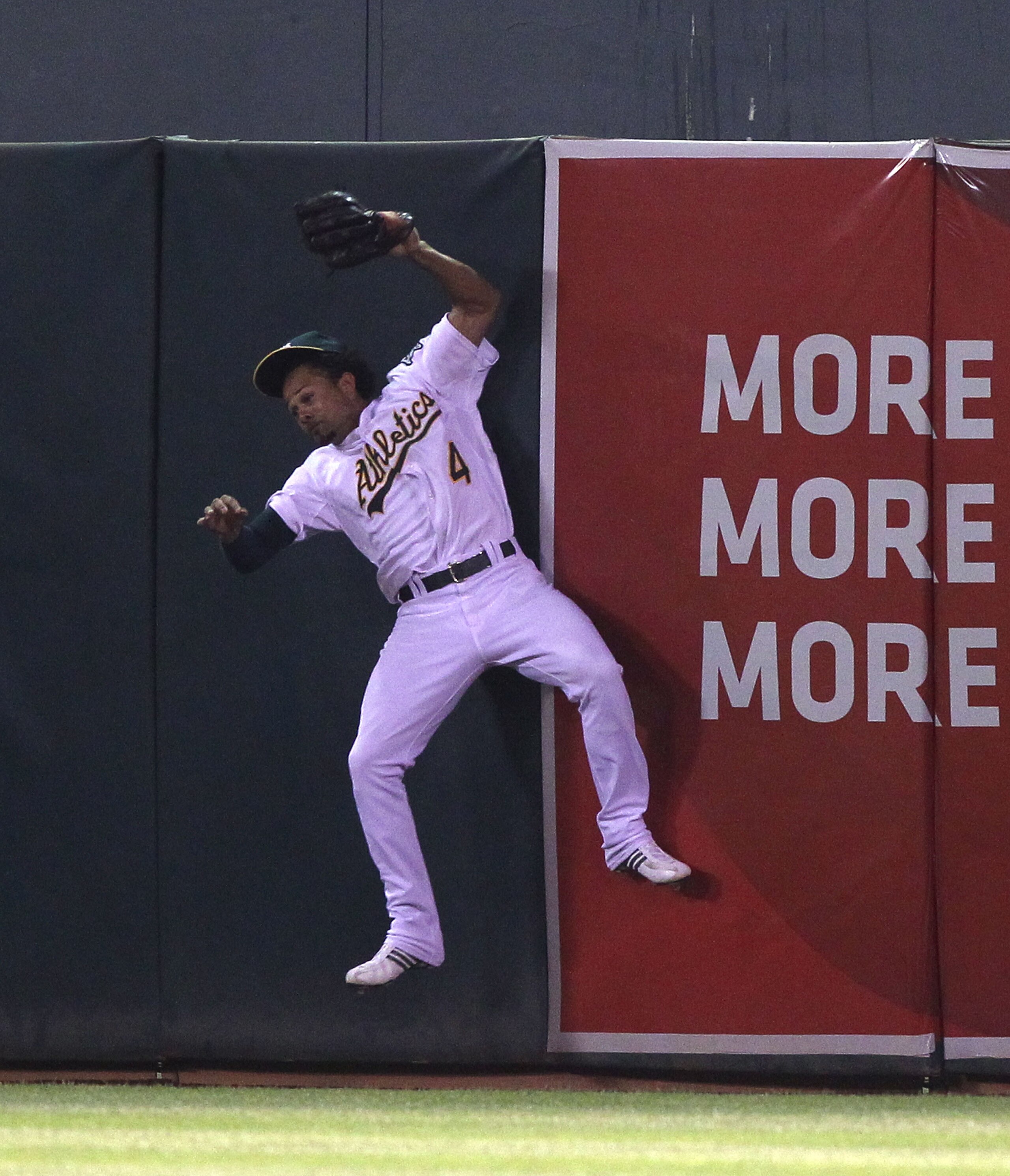 OAKLAND, CA - AUGUST 19: Coco Crisp #4 of the Oakland Athletics catches a ball hit by Matt Joyce of the Tampa Bay Rays in the sixth inning during an MLB game at the Oakland-Alameda County Coliseum on August 19, 2010 in Oakland, California. (Photo by Jed OAKLAND, CA - AUGUST 19: Coco Crisp #4 of the Oakland Athletics catches a ball hit by Matt Joyce of the Tampa Bay Rays in the sixth inning during an MLB game at the Oakland-Alameda County Coliseum on August 19, 2010 in Oakland, California. (Photo by Jed