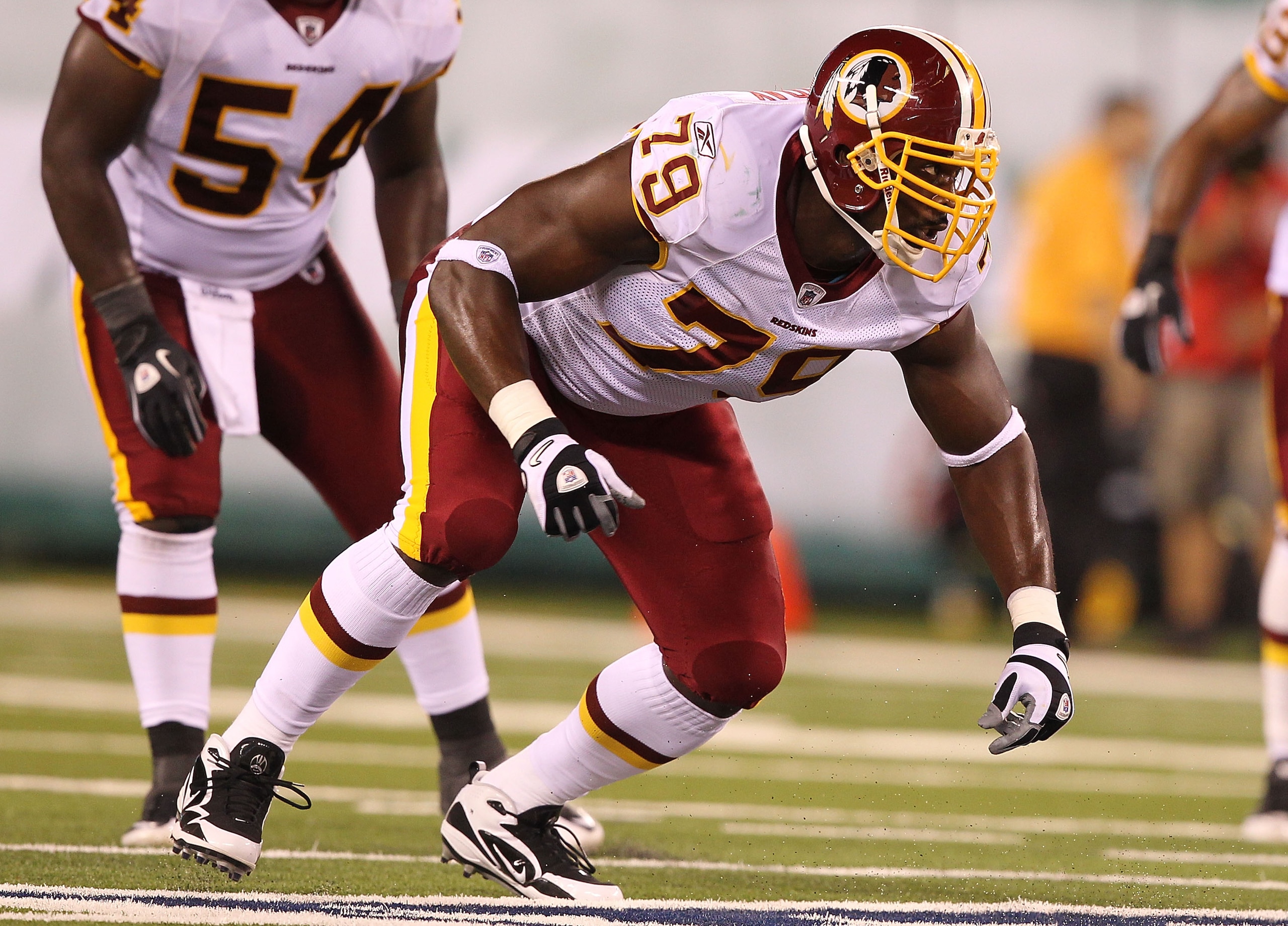 EAST RUTHERFORD, NJ - AUGUST 27:  Vonnie Holiday #79 of the Washington Redskins  in action against Vonnie Holiday during their preseason game on August 27, 2010 at the New Meadowlands Stadium  in East Rutherford, New Jersey.  (Photo by Al Bello/Getty Imag