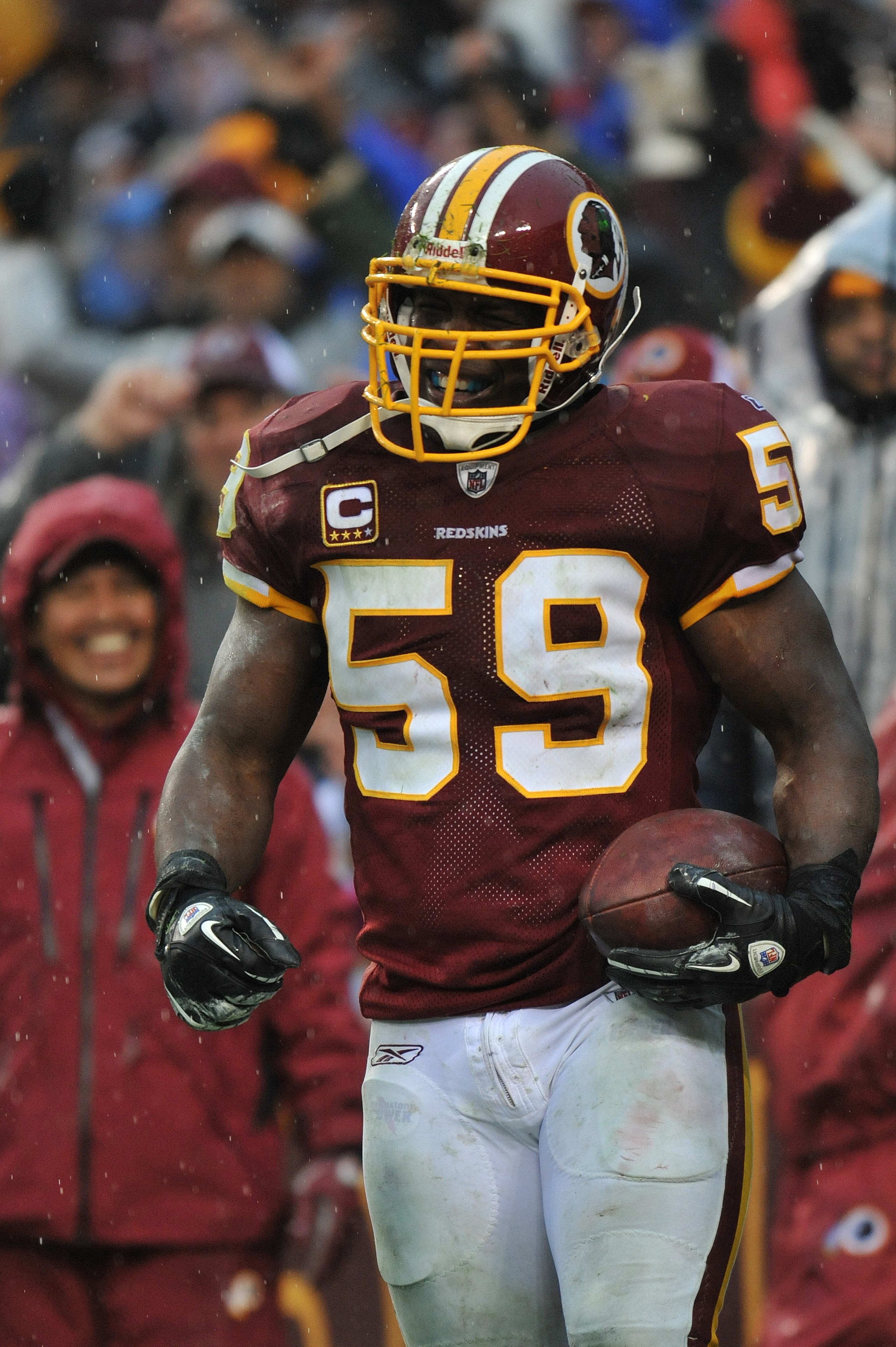 LANDOVER, MD - DECEMBER 12:  London Fletcher #59 of the Washington Redskins celebrates a goalline fumble recovery against the Tampa Bay Buccaneers  at FedExField on December 12, 2010 in Landover, Maryland. The Buccaneers defeated the Redskins 17-16. (Phot