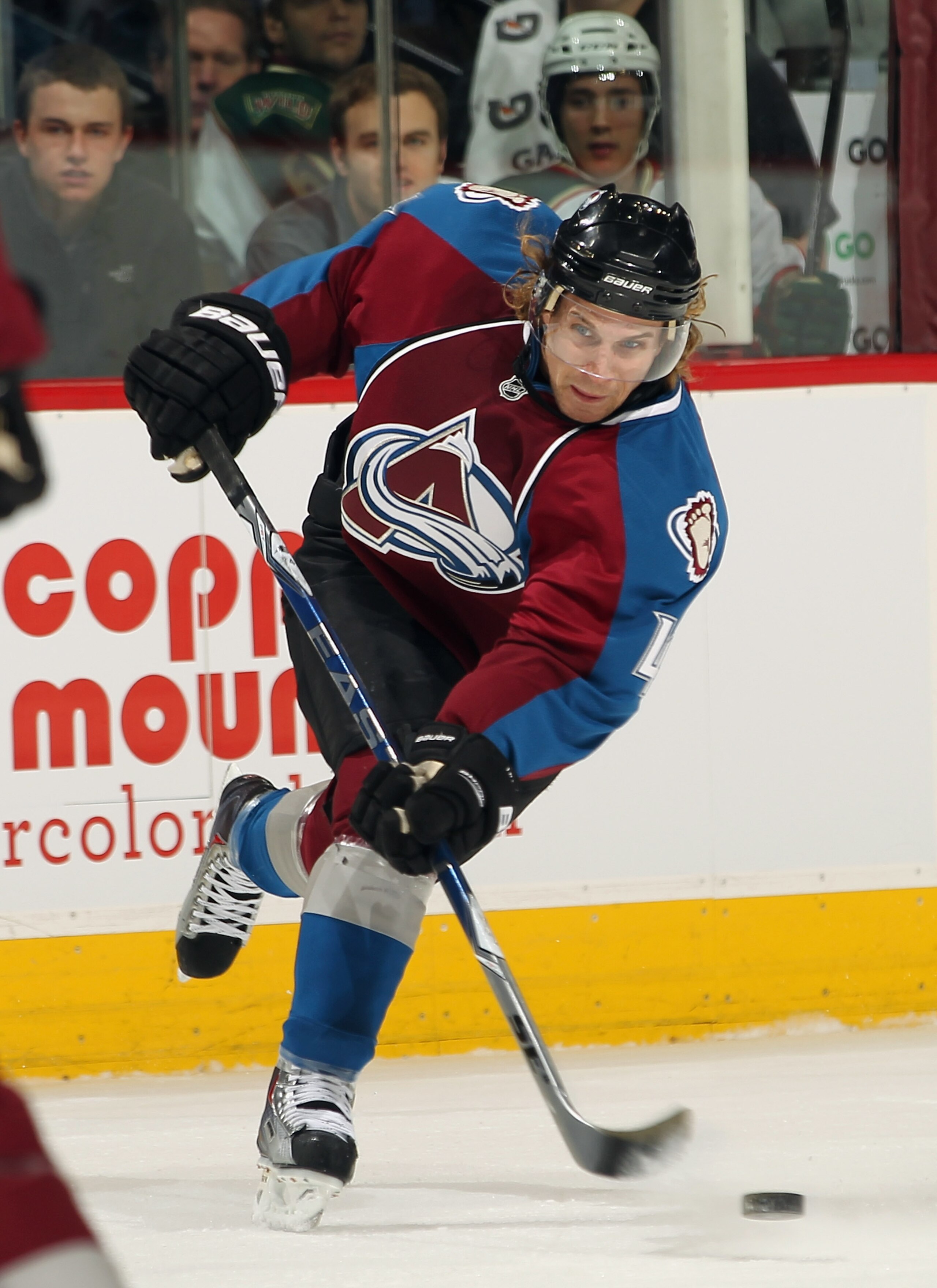 DENVER - DECEMBER 23:  John-Michael Liles #4 of the Colorado Avalanche takes a slap shot against the Minnesota Wild at the Pepsi Center on December 23, 2010 in Denver, Colorado. The Wild defeated the Avalanche 3-1.  (Photo by Doug Pensinger/Getty Images)