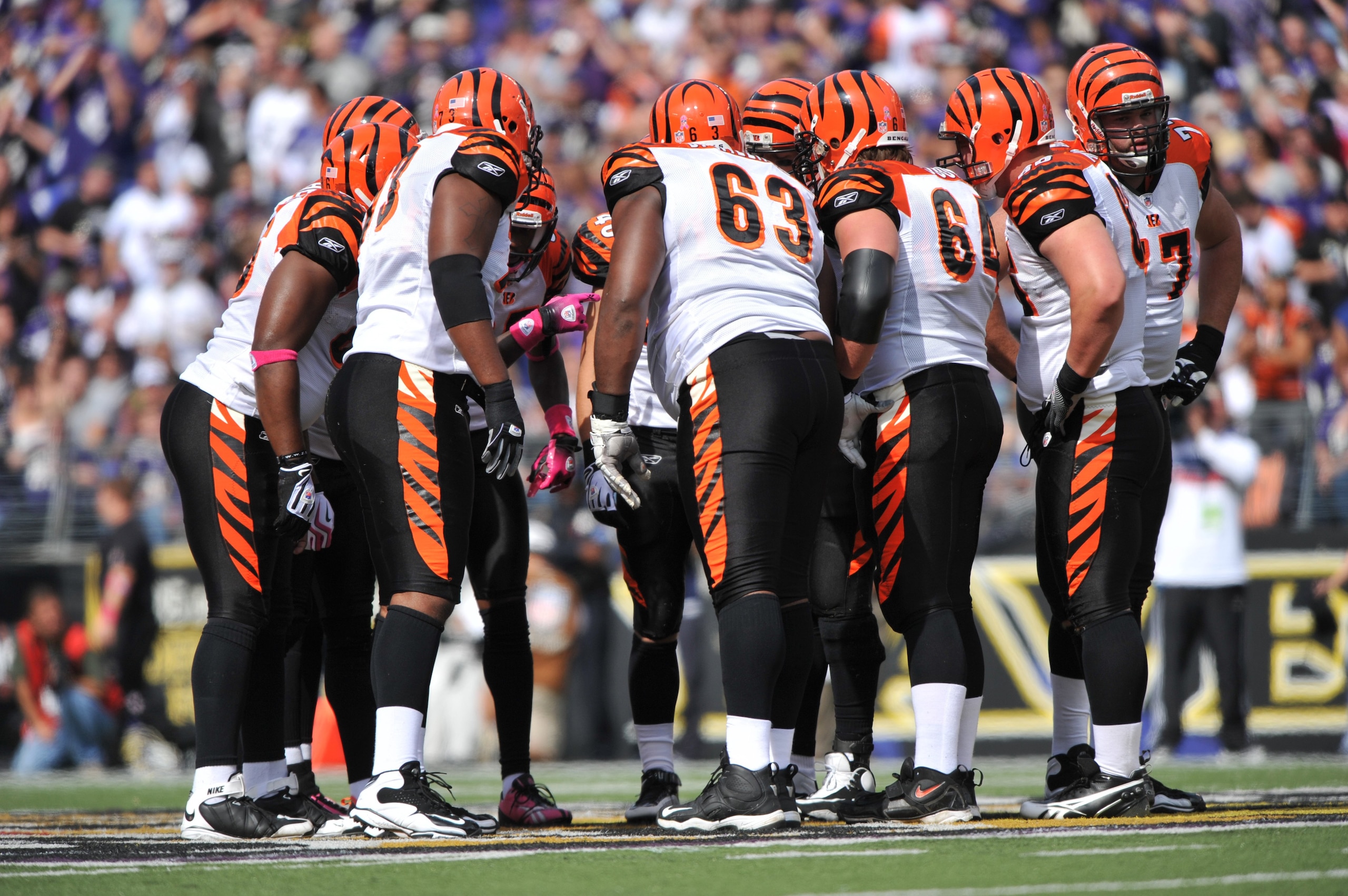 BALTIMORE - OCTOBER 11:  The Cincinnati Bengals offense huddles during the game against the Baltimore Ravens at M&T Bank Stadium on October 11, 2009 in Baltimore, Maryland. The Bengals defeated the Ravens 17-14. (Photo by Larry French/Getty Images)