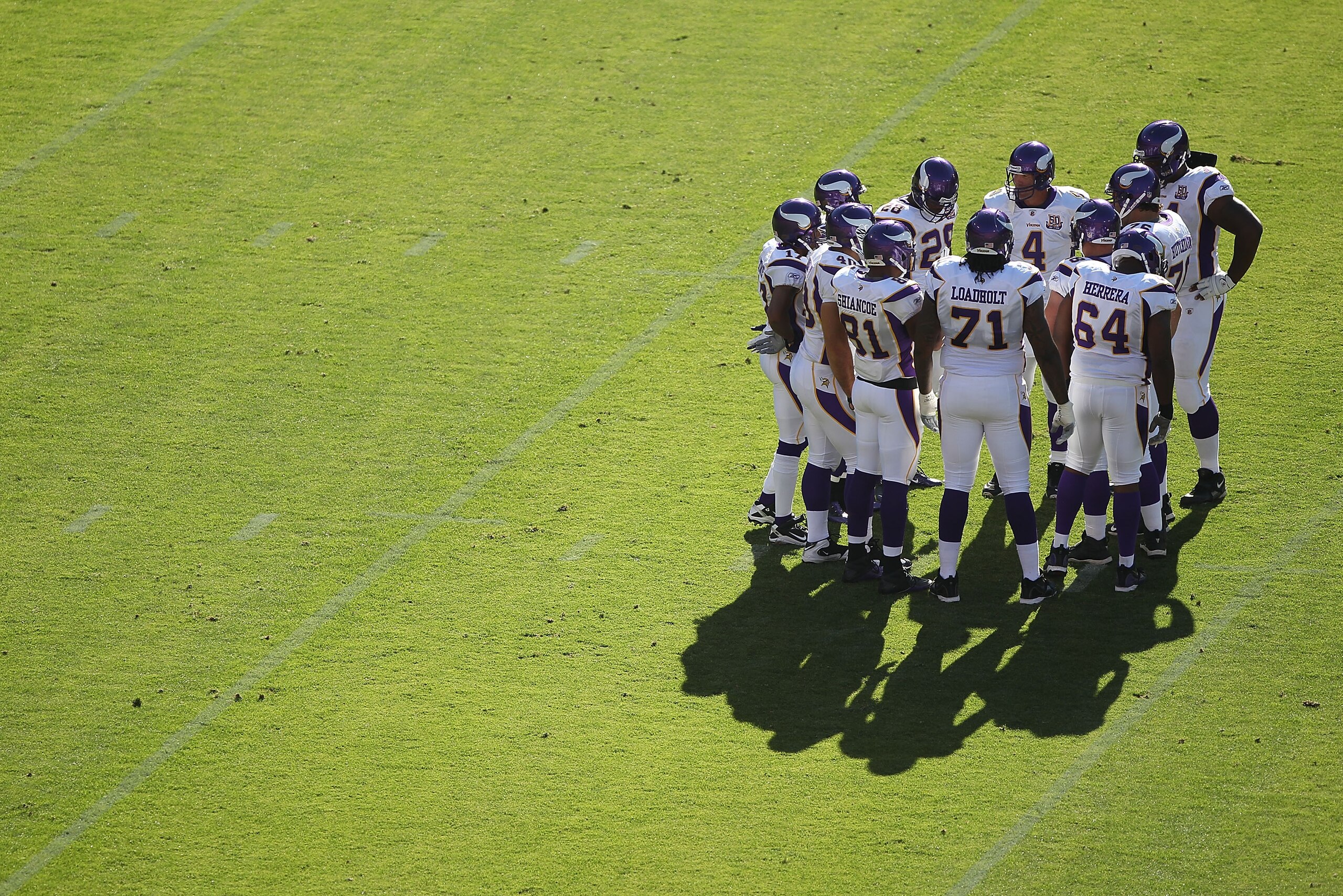 SAN FRANCISCO - AUGUST 22:  Brett Favre #4 of the Minnesota Vikings huddles with his teammates against the San Francisco 49ers during an NFL pre-season game at Candlestick Park on August 22, 2010 in San Francisco, California.  (Photo by Jed Jacobsohn/Gett