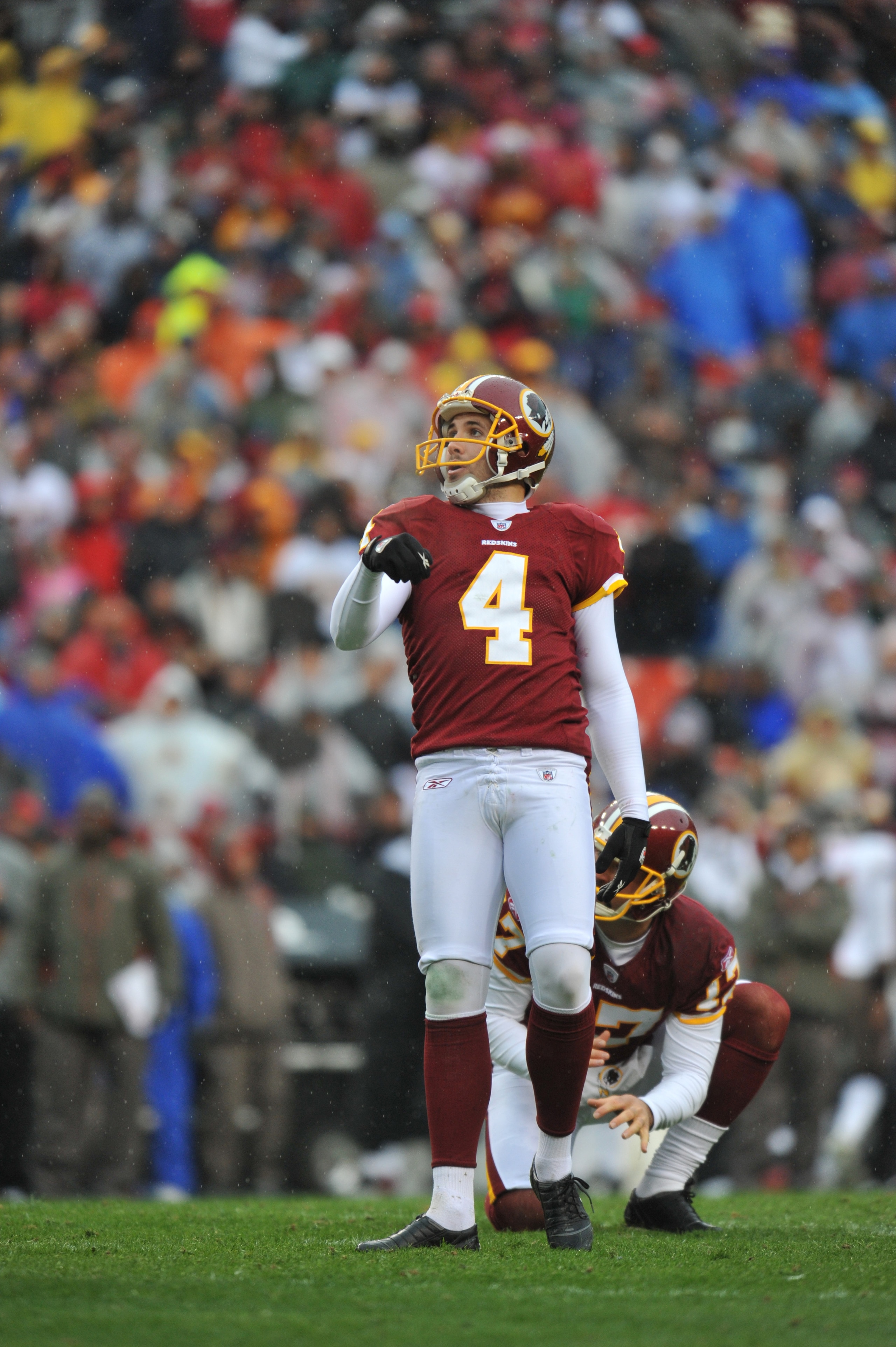 LANDOVER, MD - DECEMBER 12:  Graham Gano #4 of the Washington Redskins watches a missed field goal against the Tampa Bay Buccaneers  at FedExField on December 12, 2010 in Landover, Maryland. The Buccaneers defeated the Redskins 17-16. (Photo by Larry Fren
