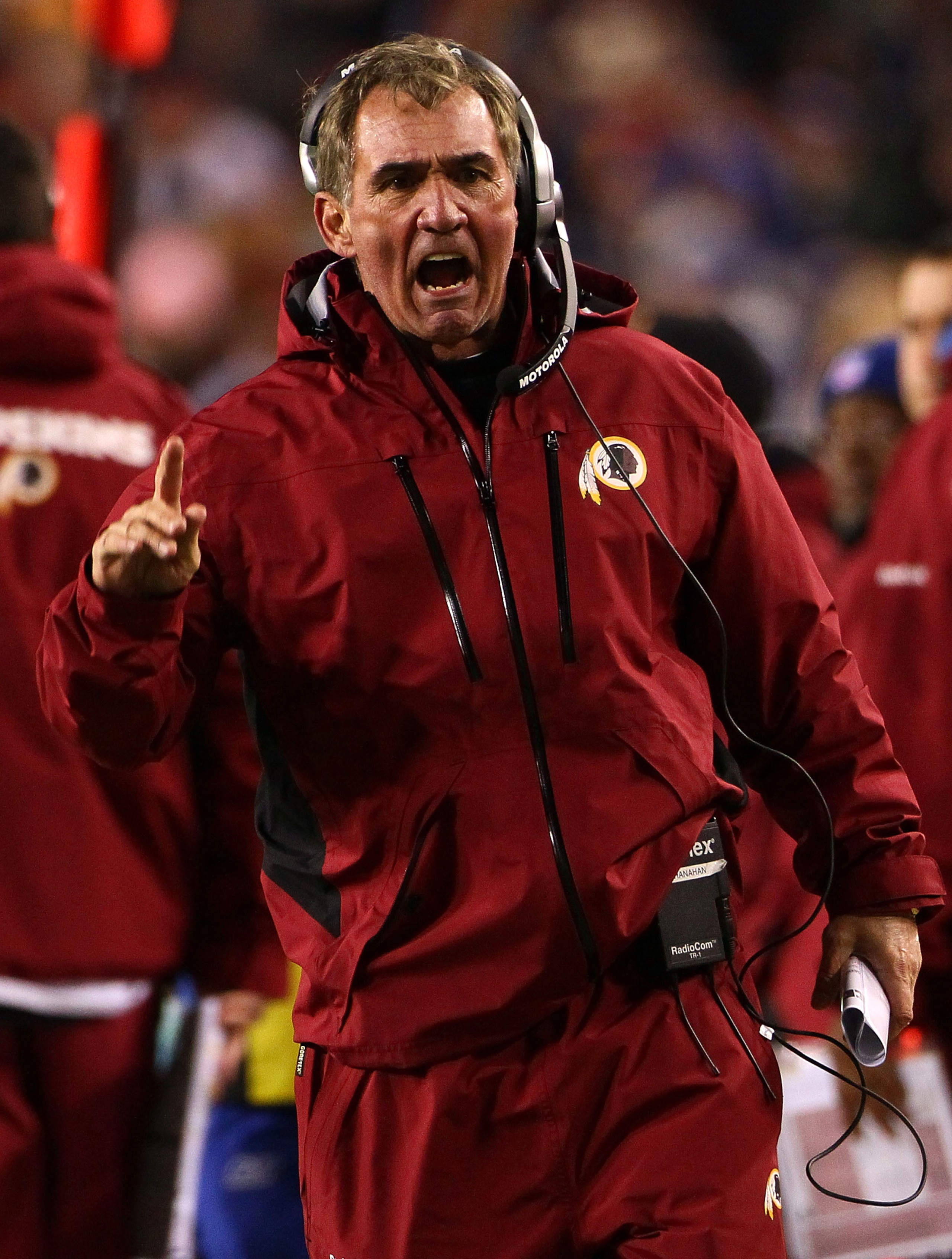 LANDOVER, MD - JANUARY 02: Washington Redskins head coach Mike Shanahan makes a point with a referee in the fourth quarter of a game against the New York Giants at FedEx Field on January 2, 2011 in Landover, Maryland. The Giants won the game 17-14.  (Phot