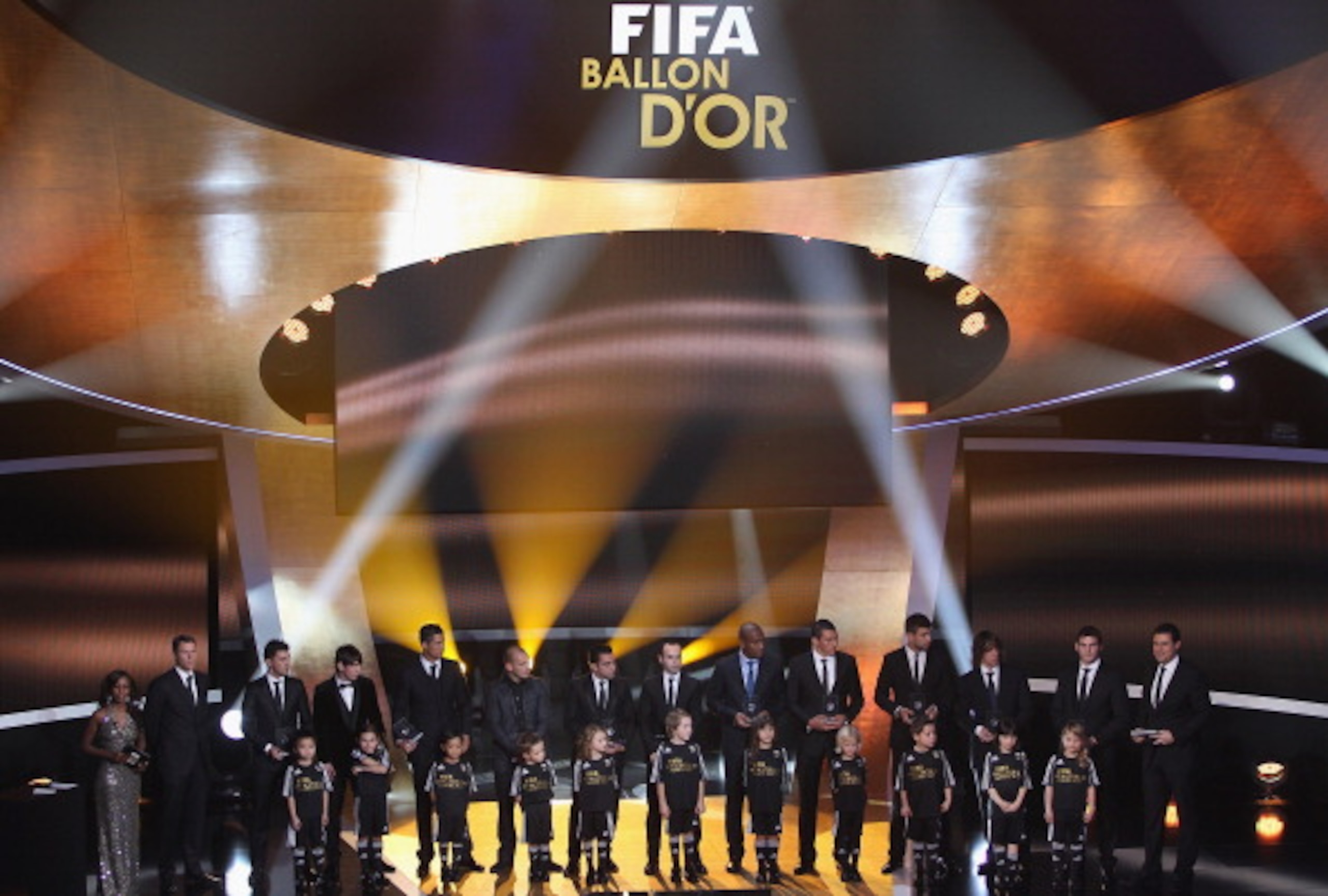 ZURICH, SWITZERLAND - JANUARY 10:  Fifa World XI award including Cristiano Ronaldo,Maicon,Lucio,Gerard Pique,Iker Casillas, front row l to r: David Villa,Lionel Messi,Wesley Sneijder,Xavi,Andres Iniesta,Puyol during the FIFA Ballon d'or Gala at the Zurich