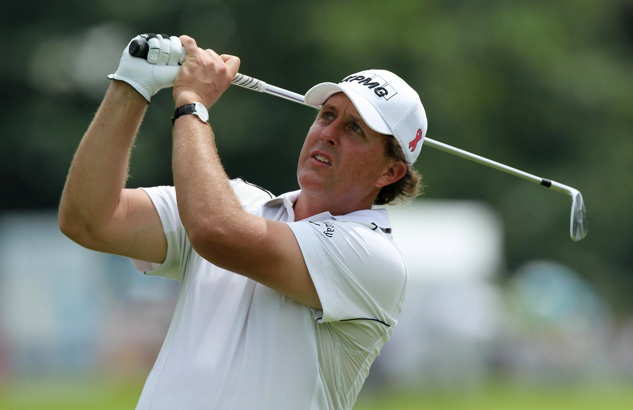 SINGAPORE - NOVEMBER 12: Phil Mickelson of USA watches his tee shot on the 1st hole during the second round of the Barclays Singapore Open held at the Sentosa Golf Club on November 12, 2010 in Singapore, Singapore. (Photo by Stanley Chou/Getty Images) SINGAPORE - NOVEMBER 12: Phil Mickelson of USA watches his tee shot on the 1st hole during the second round of the Barclays Singapore Open held at the Sentosa Golf Club on November 12, 2010 in Singapore, Singapore. (Photo by Stanley Chou/Getty Images)