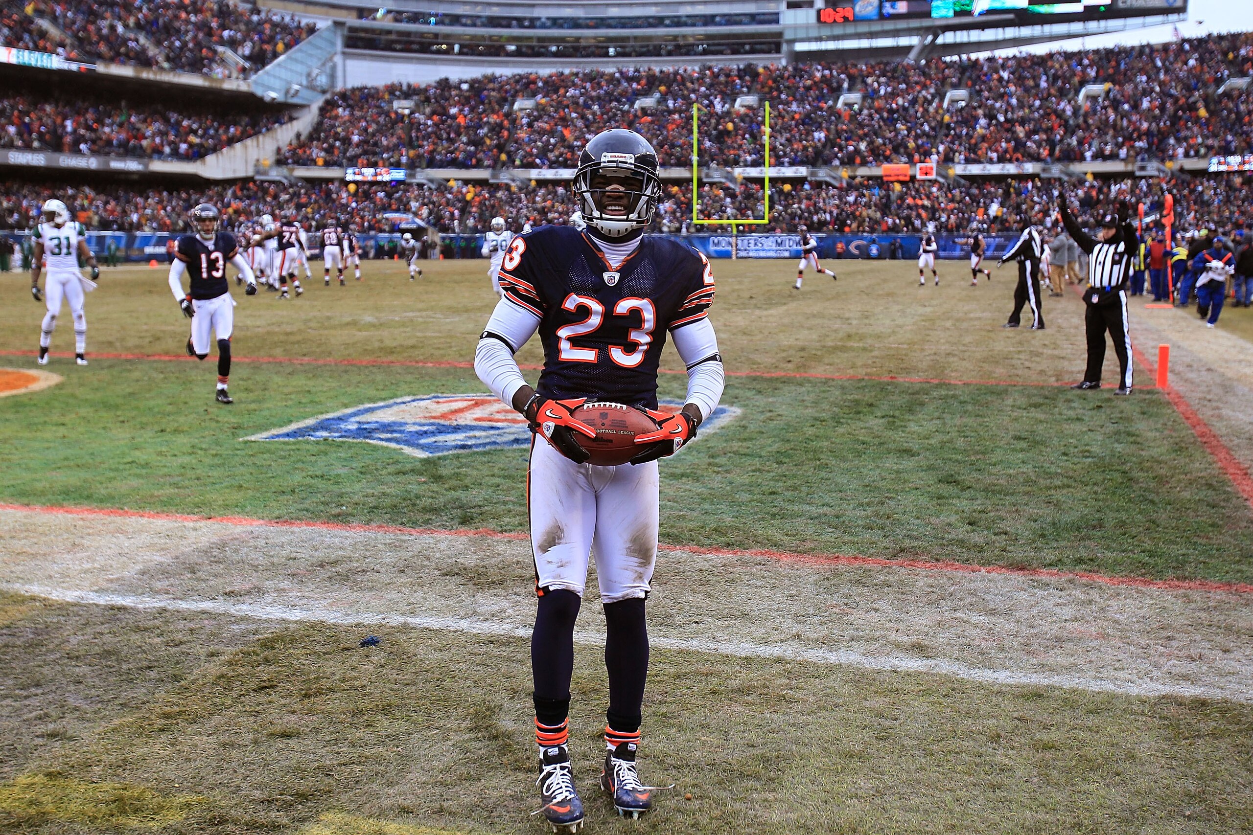 CHICAGO, IL - DECEMBER 26: Devin Hester #23 of the Chicago Bears celebrates a touchdown catch against the New York Jets at Soldier Field on December 26, 2010 in Chicago, Illinois. The Bears defeated the Jets 38-34. (Photo by Jonathan Daniel/Getty Images)