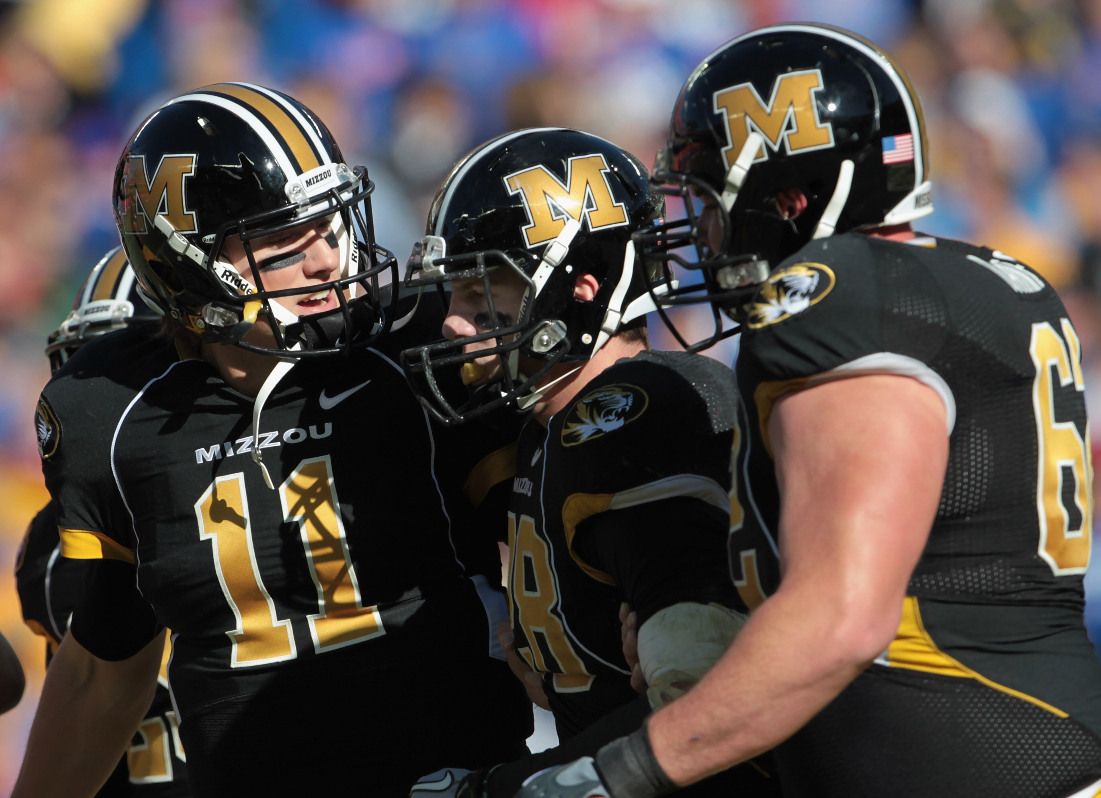 KANSAS CITY, MO - NOVEMBER 27: Quarterback Blaine Gabbert #11 of the Missouri Tigers congratulates receiver T.J. Moe #28 after a touchdown during the game against the Kansas Jayhawks on November 27, 2010 at Arrowhead Stadium in Kansas City, Missouri. (P KANSAS CITY, MO - NOVEMBER 27: Quarterback Blaine Gabbert #11 of the Missouri Tigers congratulates receiver T.J. Moe #28 after a touchdown during the game against the Kansas Jayhawks on November 27, 2010 at Arrowhead Stadium in Kansas City, Missouri. (P