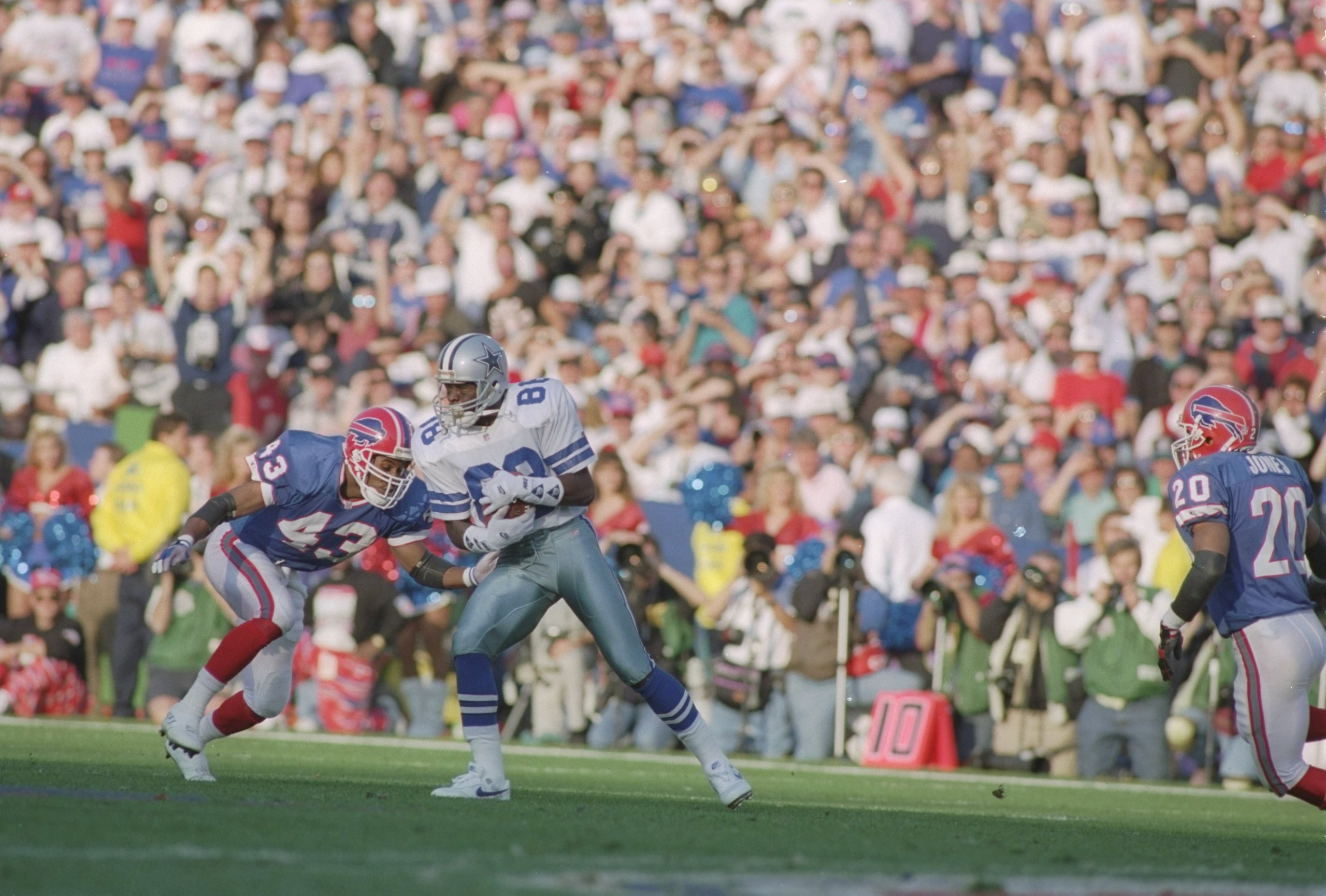31 Jan 1993:  Defensive back Matt Darby (left) of the Buffalo Bills charges against wide receiver Michael Irvin of the Dallas Cowboys during the Super Bowl XVII game at the Rose Bowl in Pasadena, California. The Cowboys defeated the Bills 52-17. Mandatory