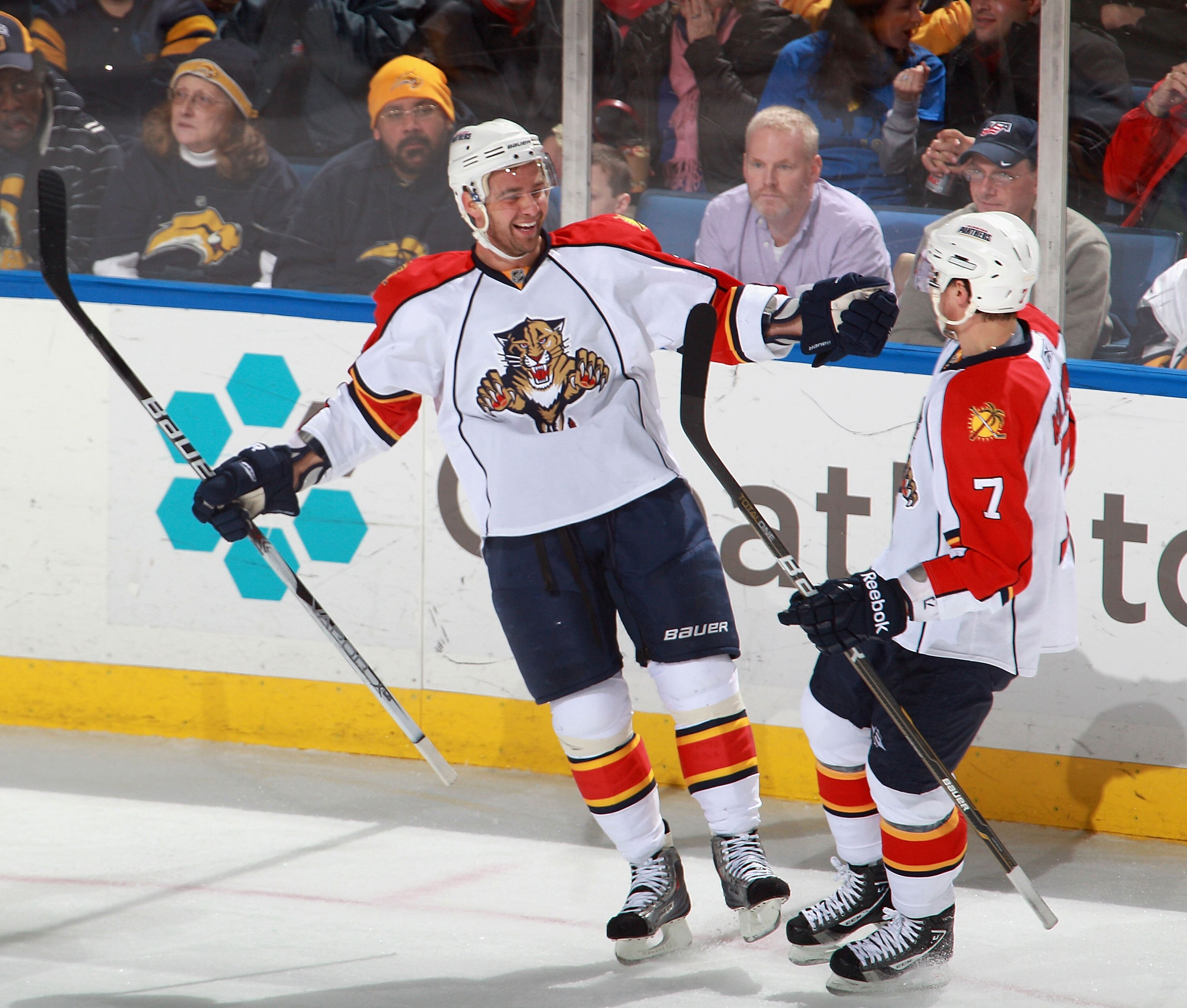 BUFFALO, NY - DECEMBER 23: Chris Higgins #21 and Dmitry Kulikov #7 of the Florida Panthers celebrate Higgins goal in the first period against the Buffalo Sabres at HSBC Arena on December 23, 2010 in Buffalo, New York.  (Photo by Rick Stewart/Getty Images)